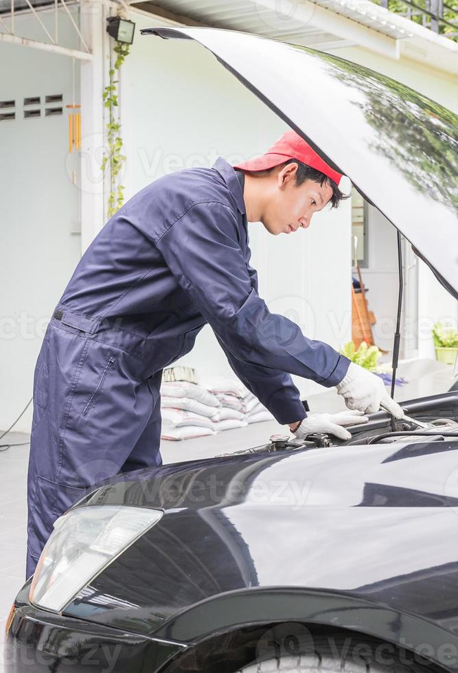 Auto mechanic check engine car photo