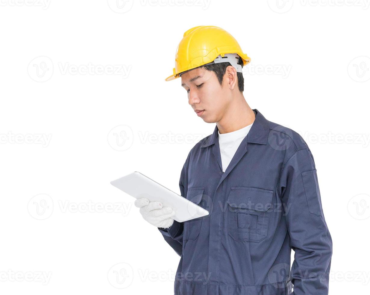 Worker using a tablet and holding blueprint on white photo