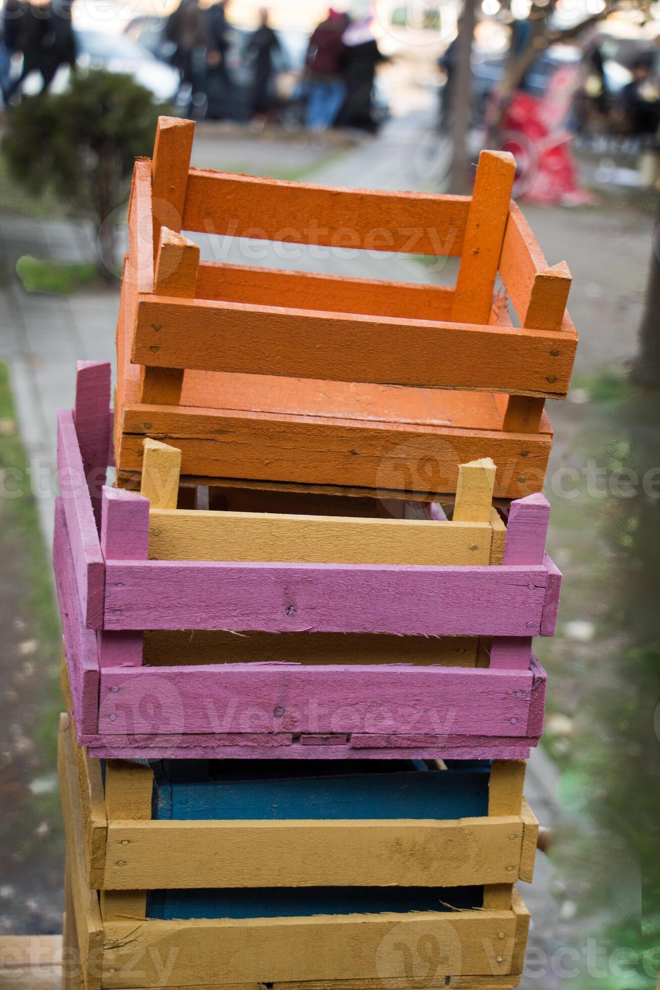Colorful wooden crate boxes for sale in a market place 16007340 Stock