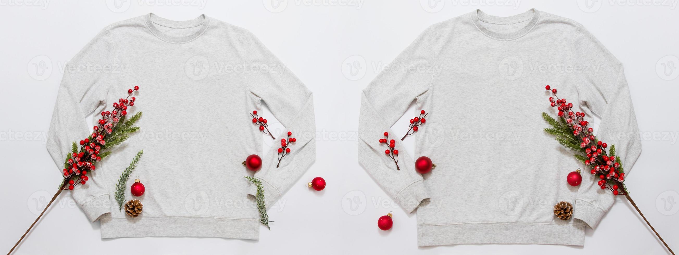 Banner Close up blank template shirt, gray sweatshirt hoodie with copy space. Christmas Holiday concept. Top view mockup sweater isolated on white background. Happy New Year decorations. Xmas jamper photo