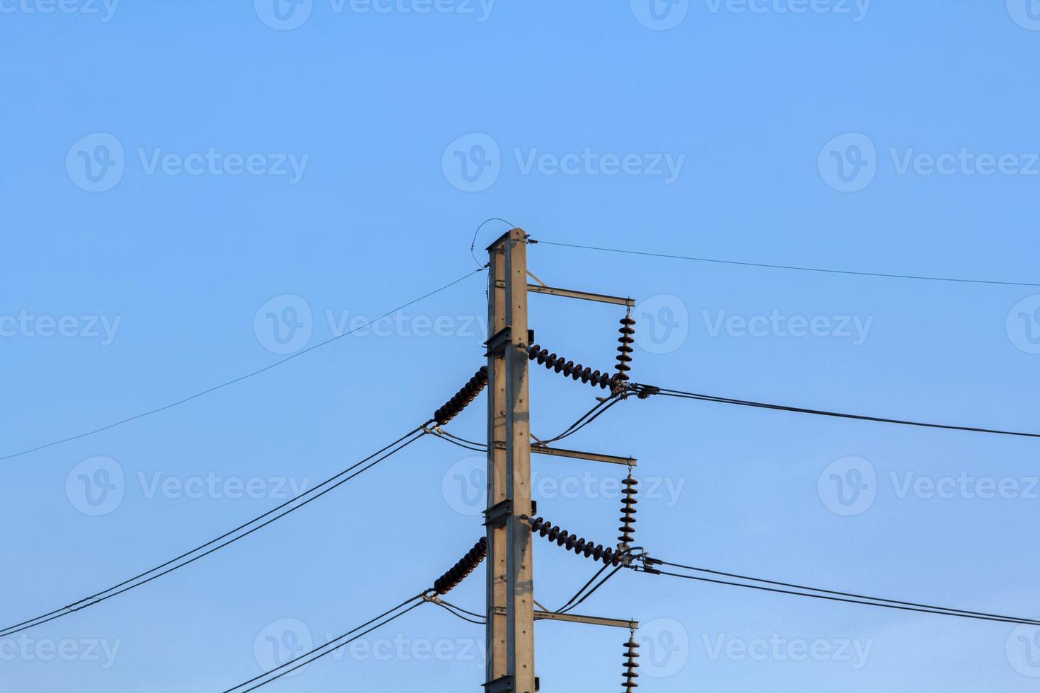 consumer medium-voltage power pole is the people to use energy and small industry in the warm and romantic evening sky atmosphere. photo