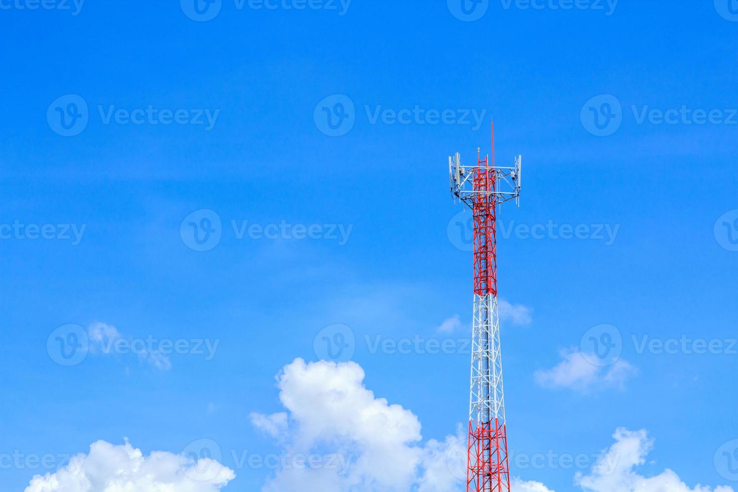 Tall telephone poles are ready to distribute Internet and telephone signals for the public to make full use of them against the background of the beautiful natural afternoon white and blue sky. photo