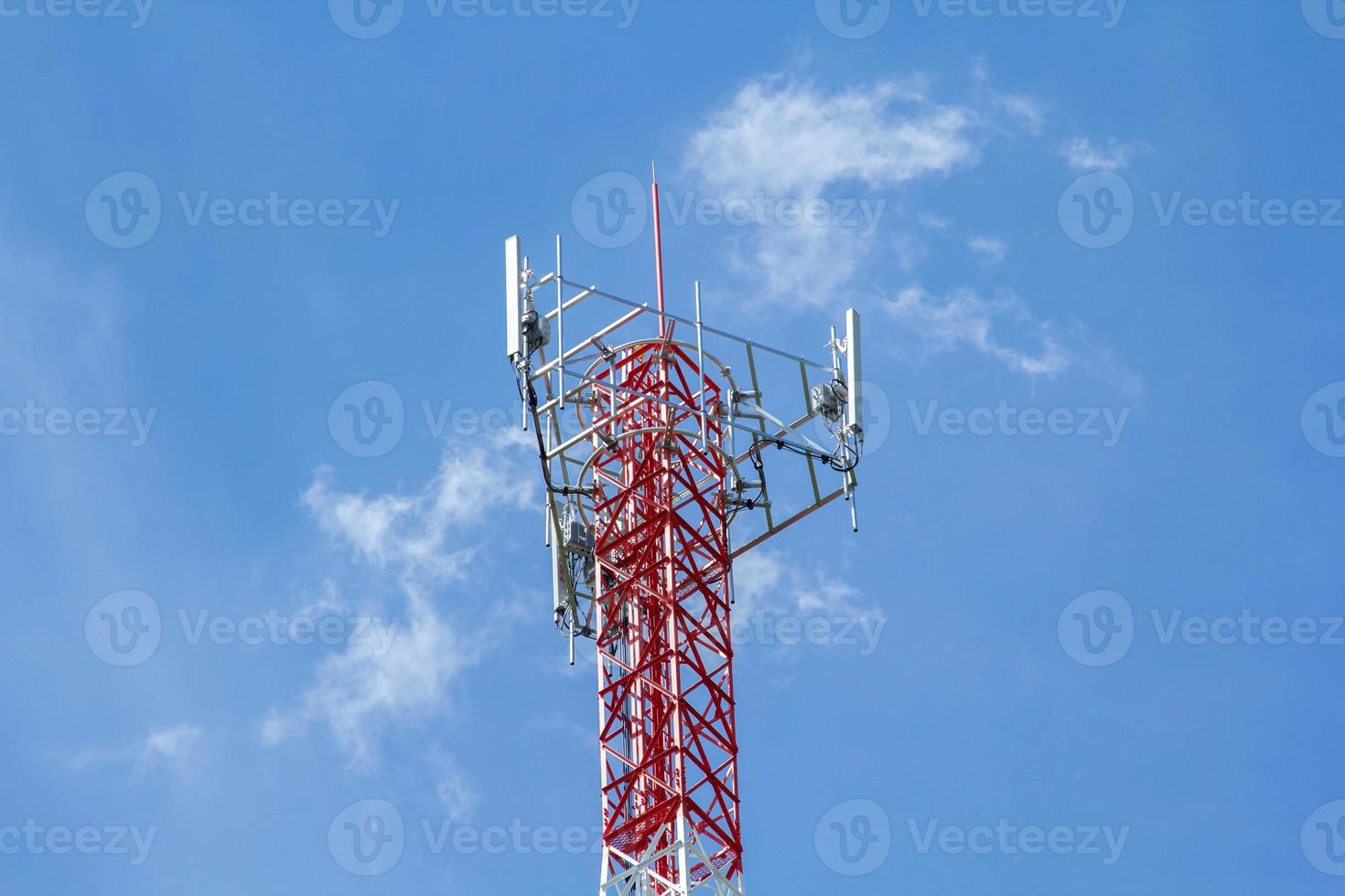Tall telephone poles are ready to distribute Internet and telephone signals for the public to make full use of them against the background of the beautiful natural afternoon white and blue sky. photo