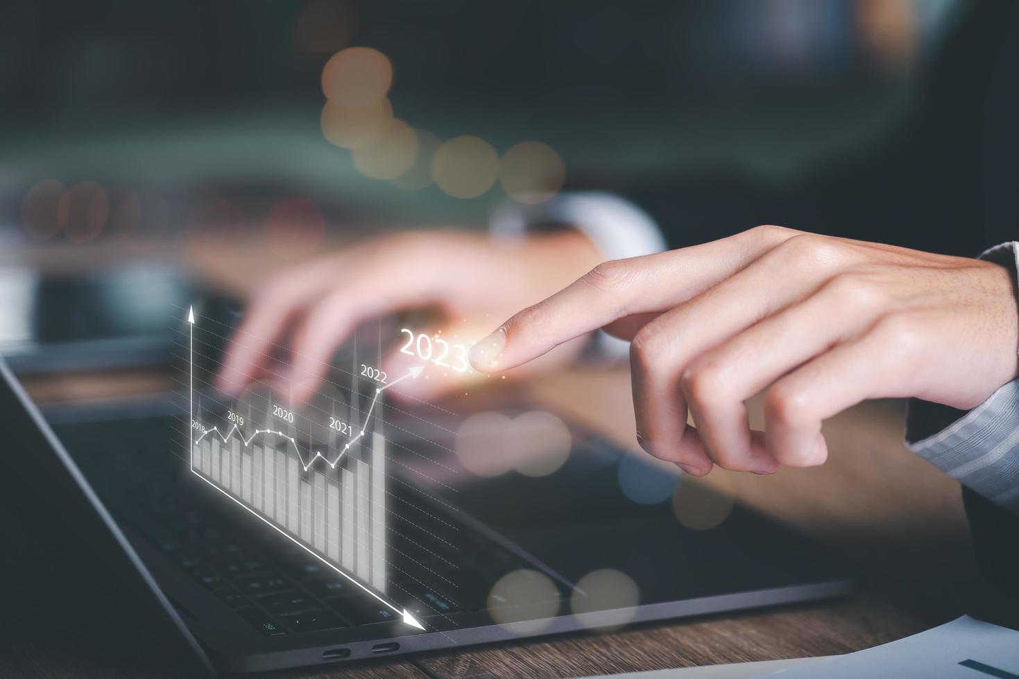 Businessman showing business growth and success graph ,concept of progress in development, financial efficiency and investment with business strategy for goals and opportunities in the industry future photo