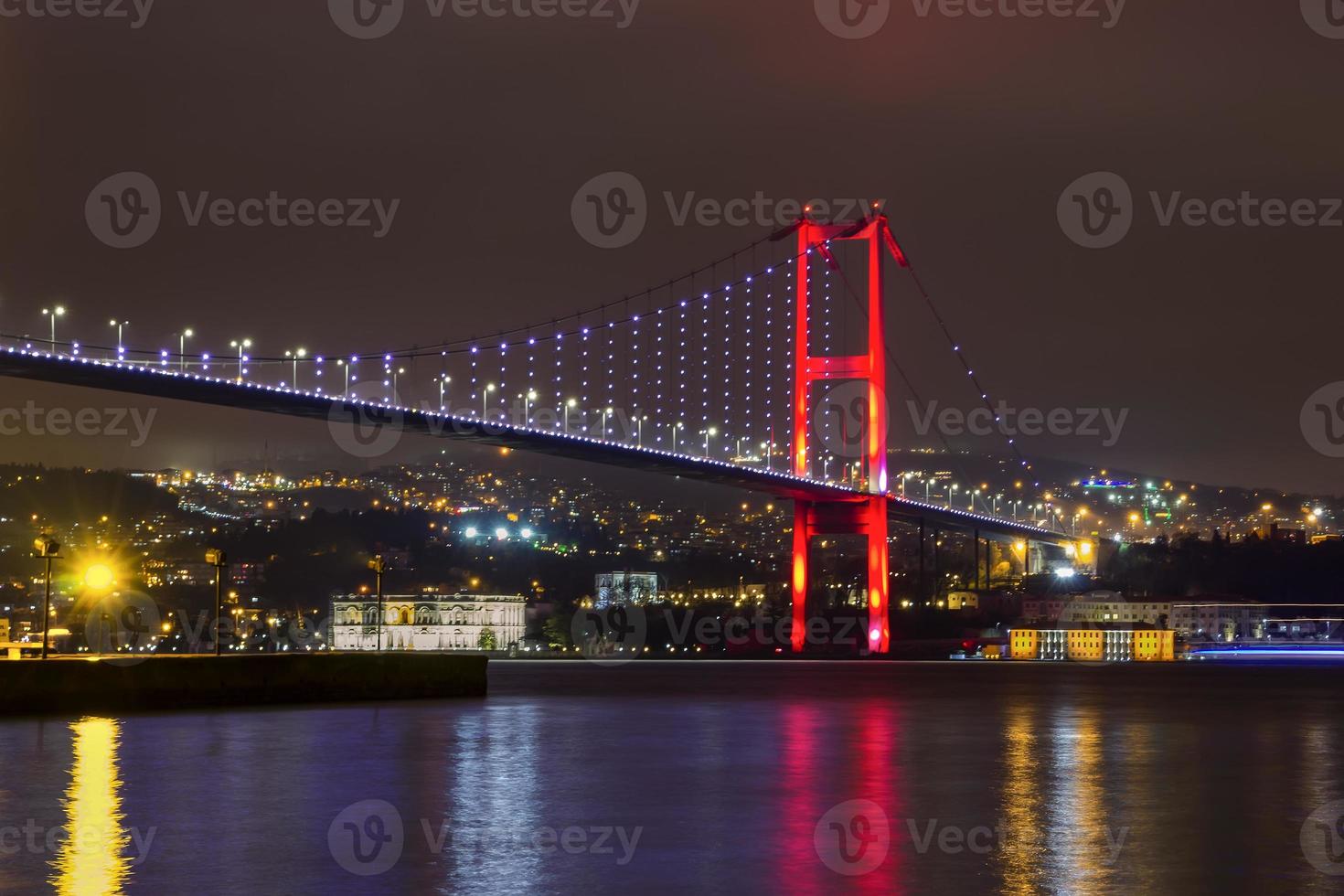 Night view of Bosphorus bridge with lights Istanbul, Turkey photo