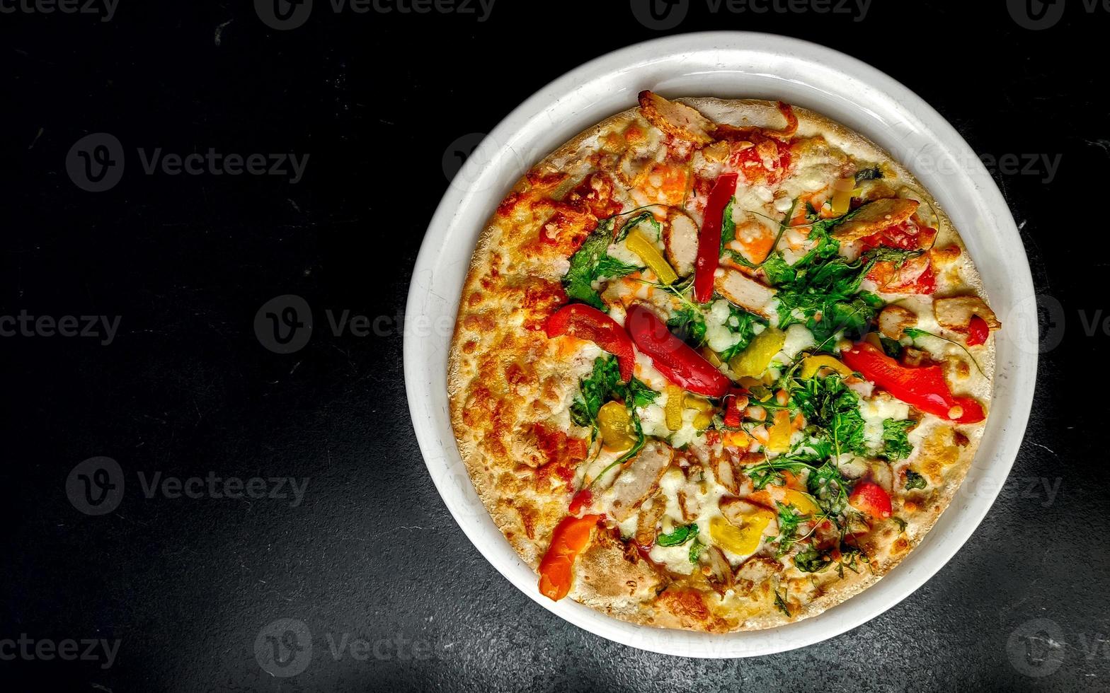 Pizza fresh from the oven photo