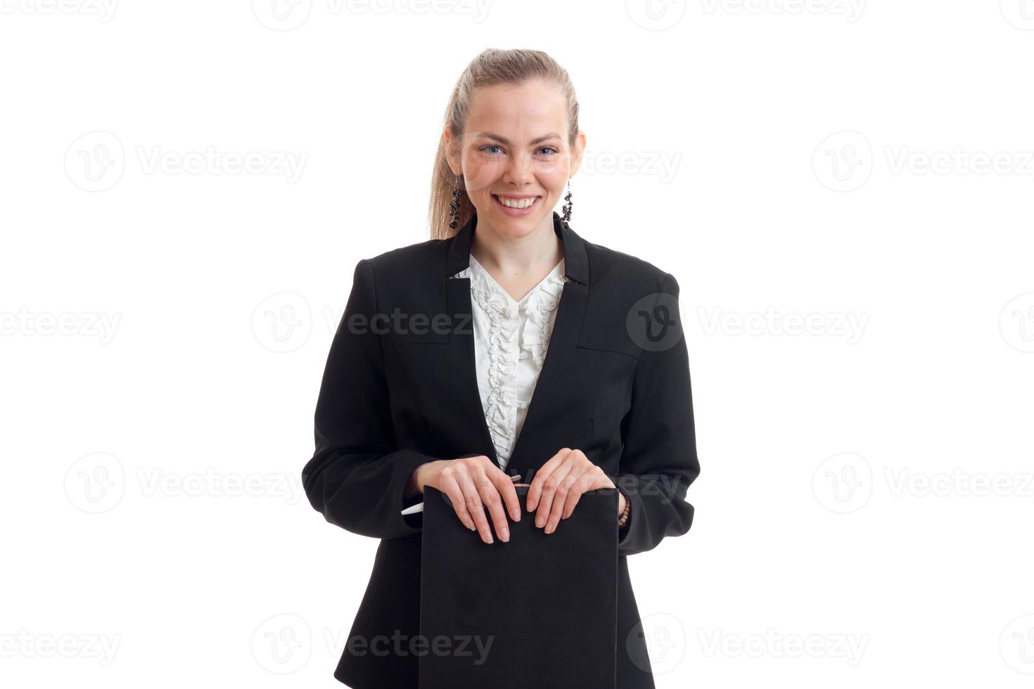 charming Office blonde in black suit laughs and holds the Tablet photo