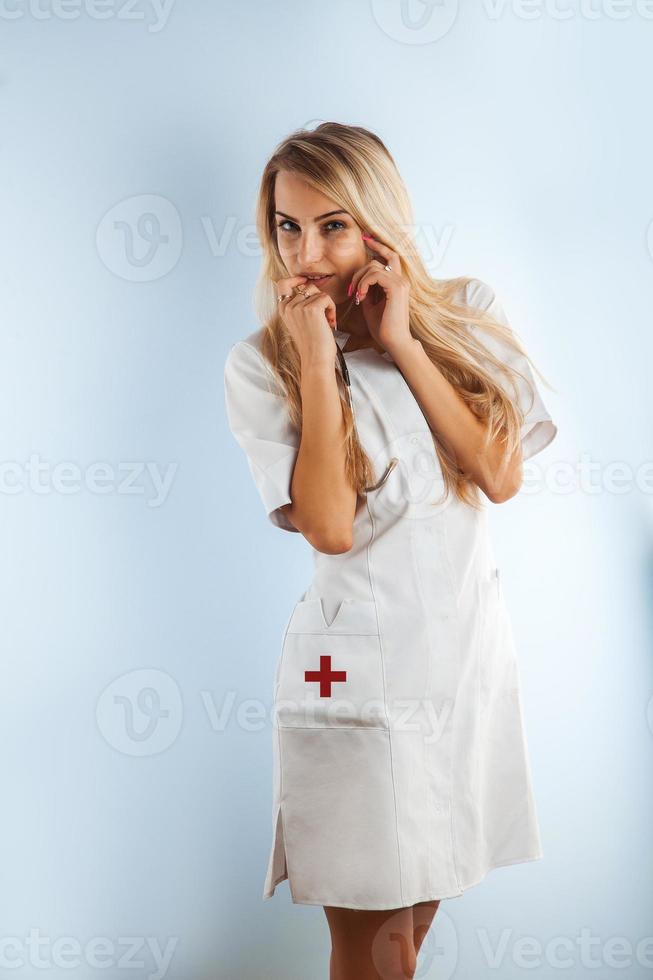 Sweet blonde nurse seduce photo