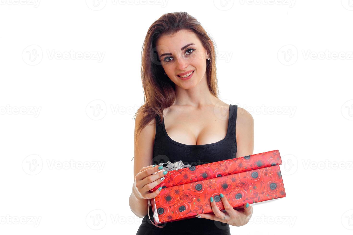 beautiful smiling girl with a gift in a big red box photo