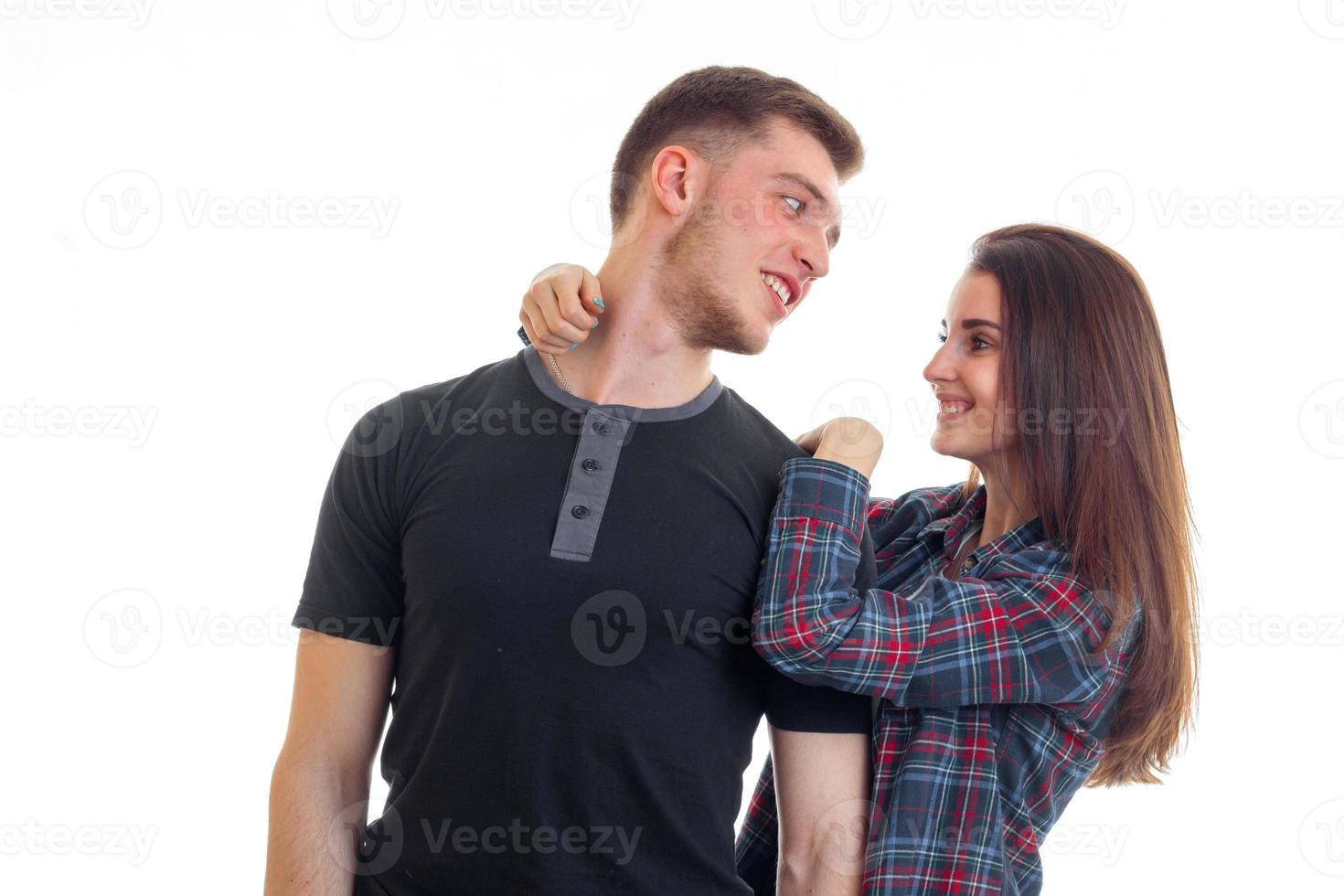fun romantic couple standing near and stare at each other close-up photo