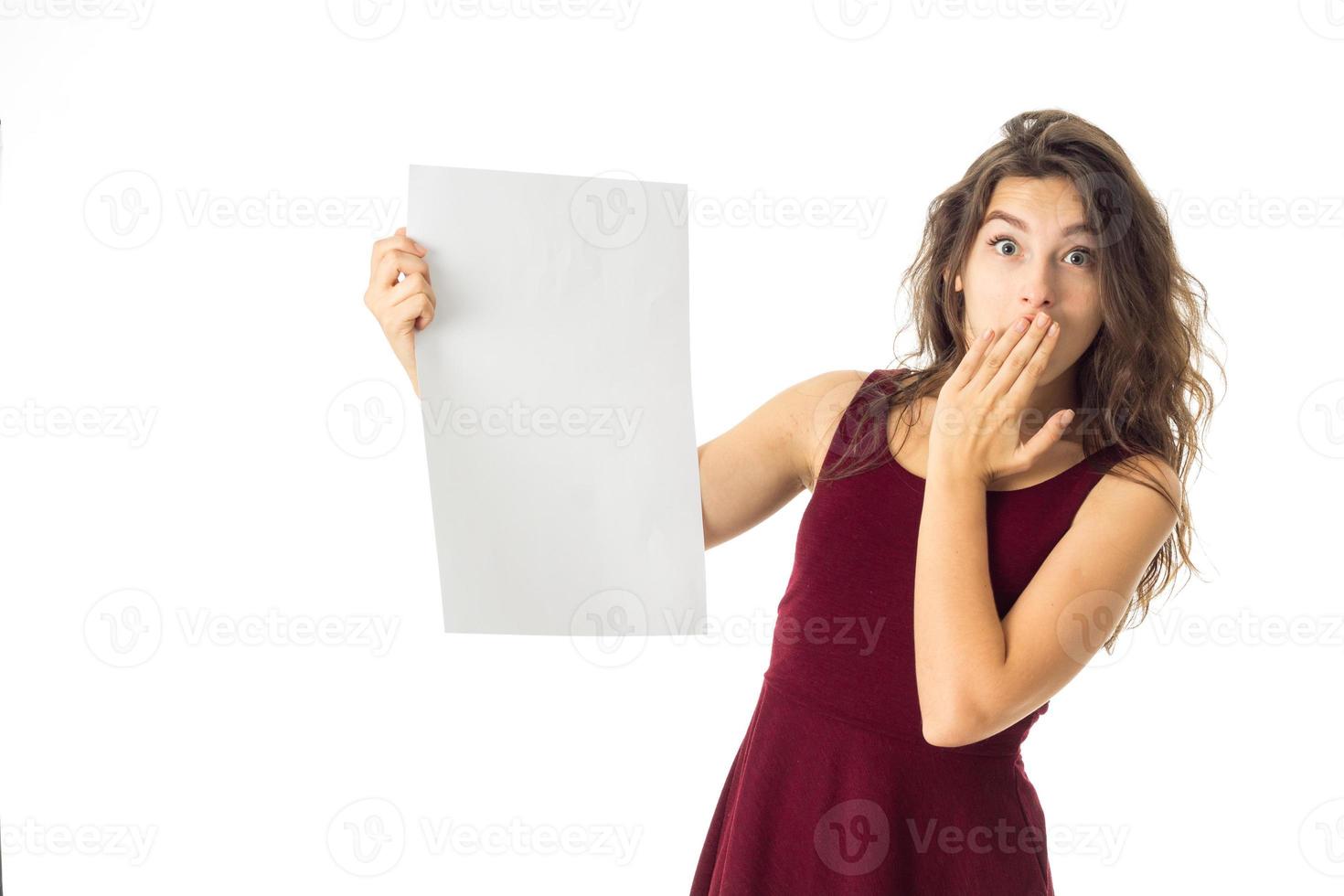 girl in red dress with white placard photo