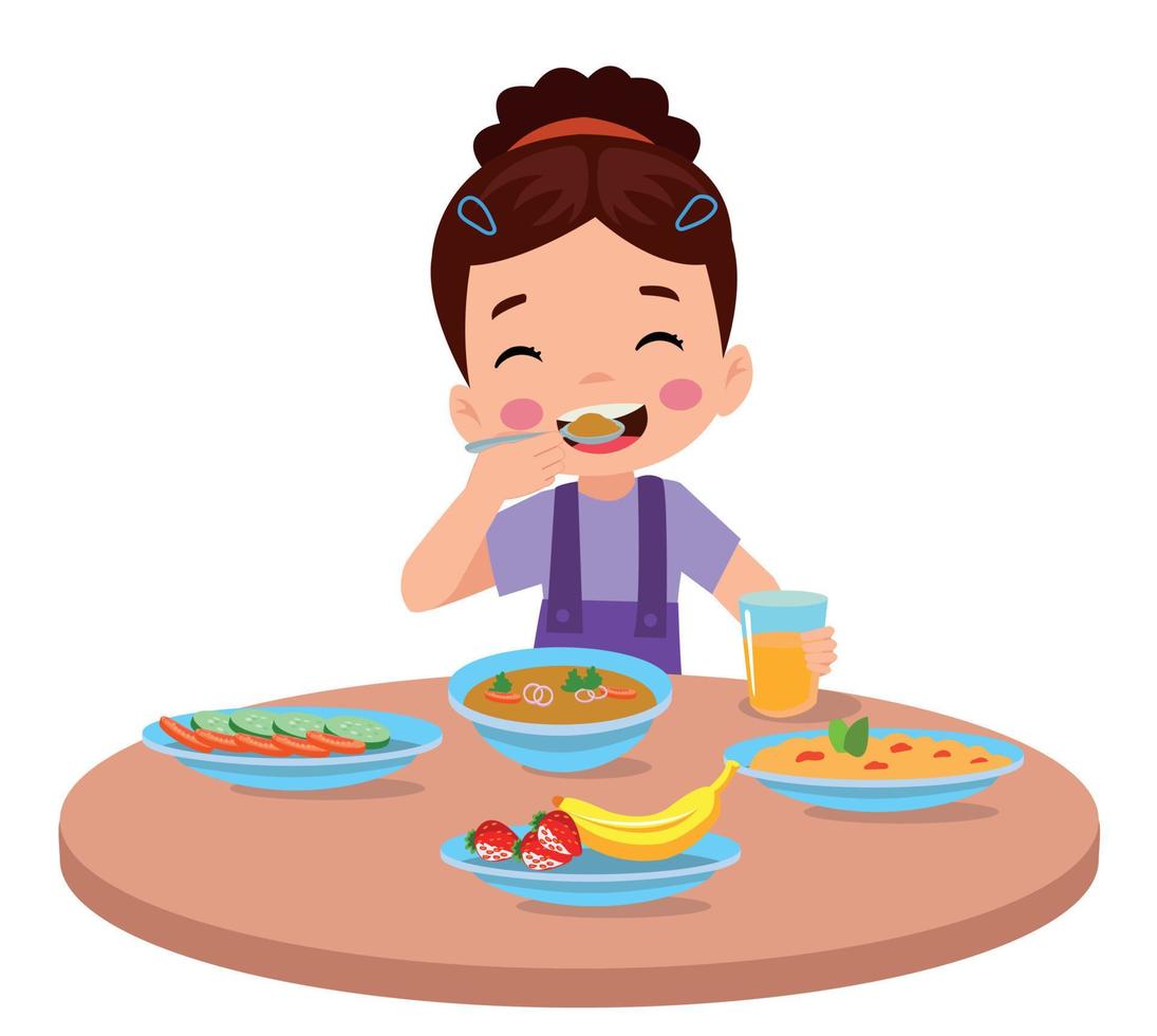 lindo niño comiendo en la mesa vector