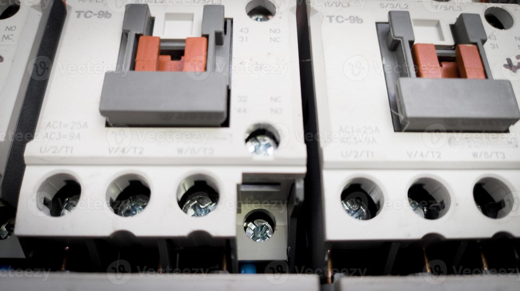 Close up the Contactors in panel circuit control. photo