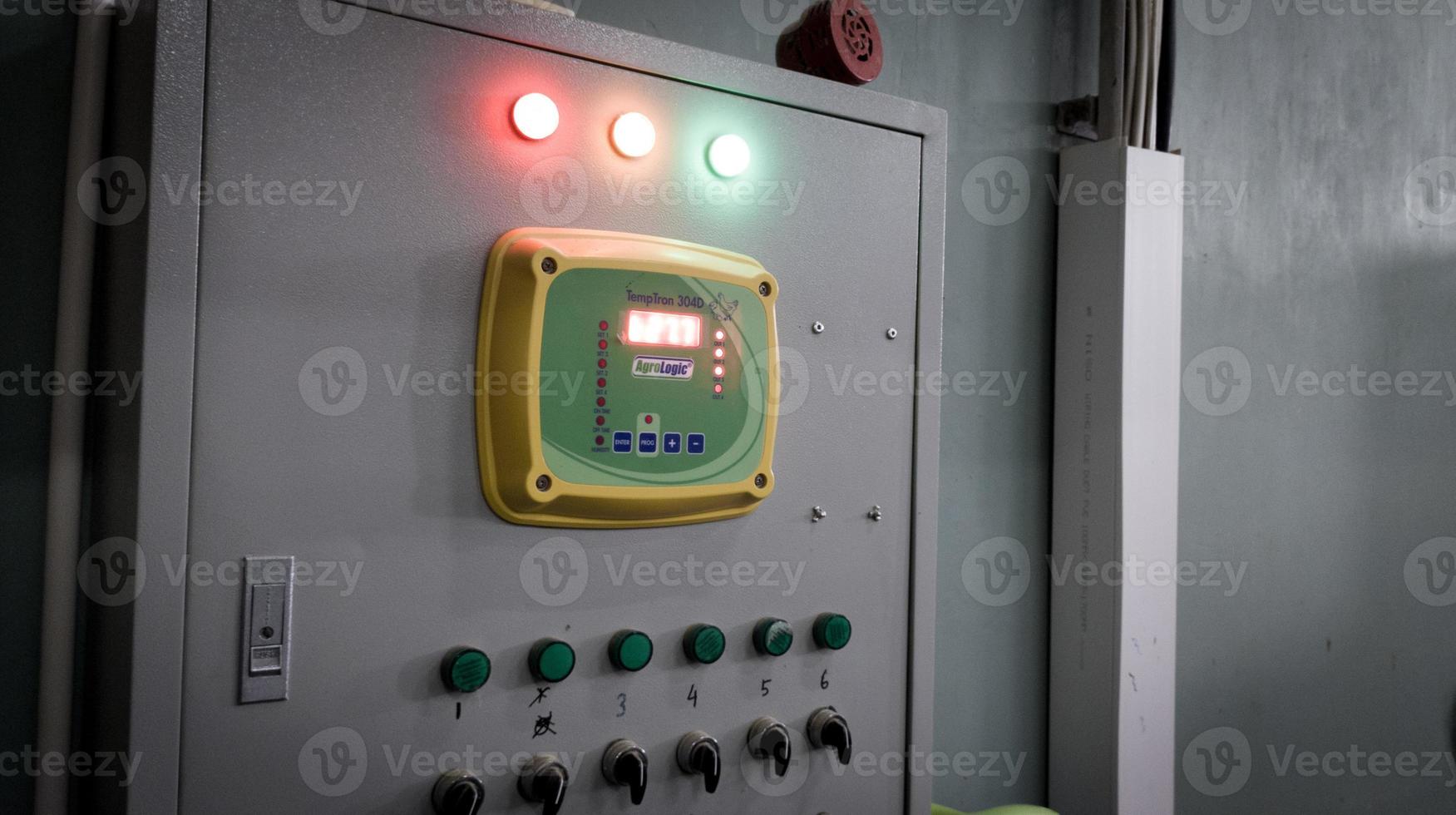 TempTron panel for controling ventilation in industry farm technology. photo