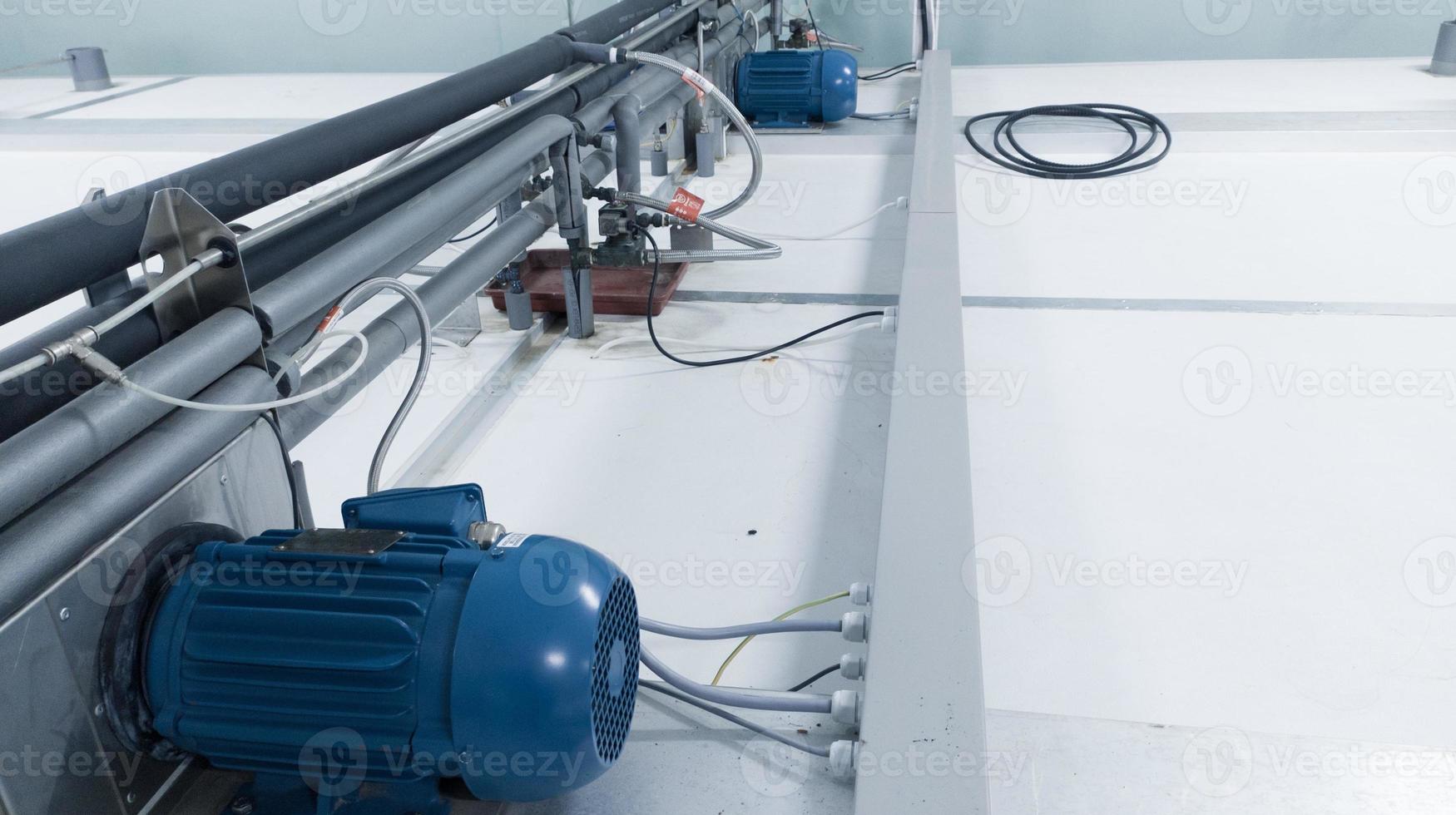 Induction motor instaled on incubation machine hatchery technology to moving  the fan. photo