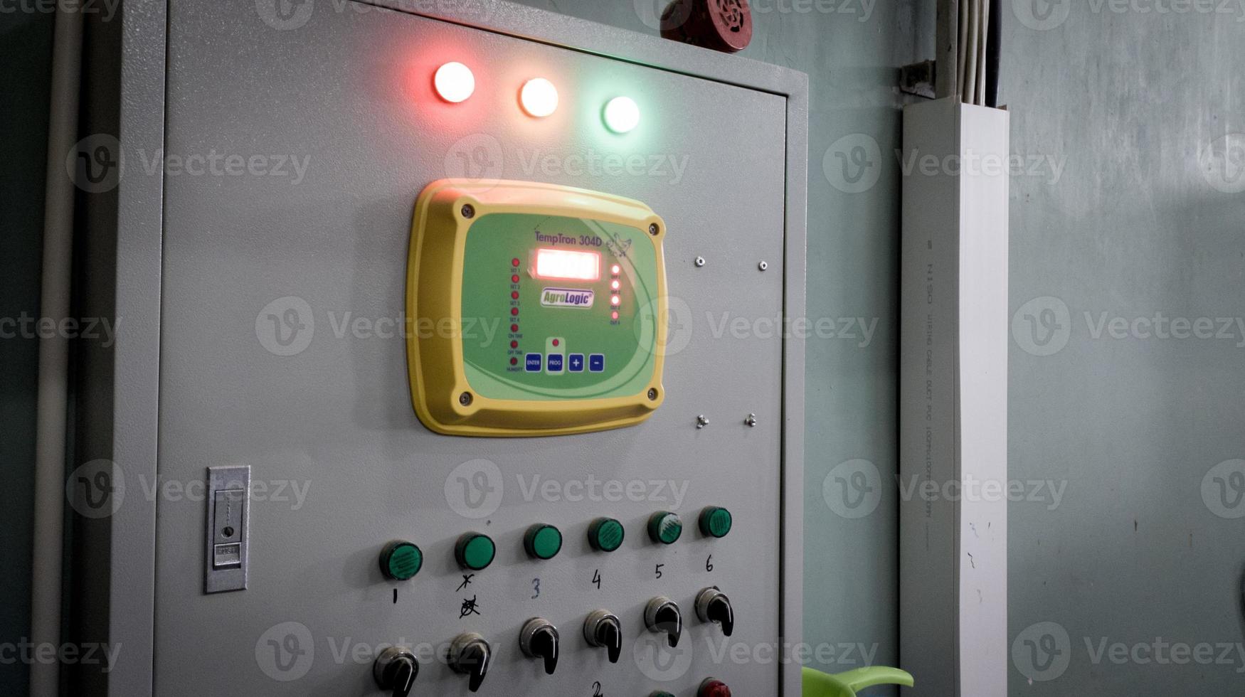 TempTron panel for controling ventilation in industry farm technology. photo