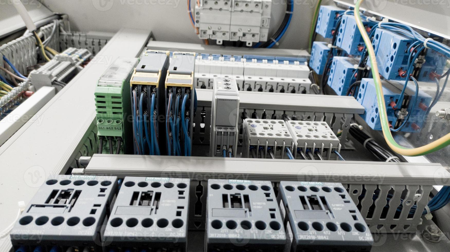 Close up the Contactors in panel circuit control. photo