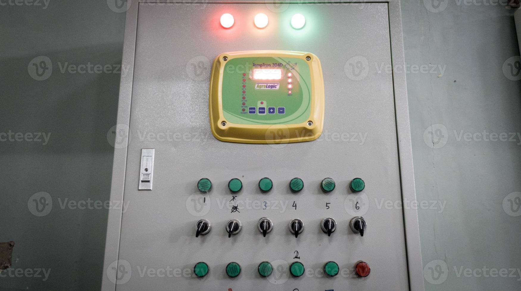 TempTron panel for controling ventilation in industry farm technology. photo