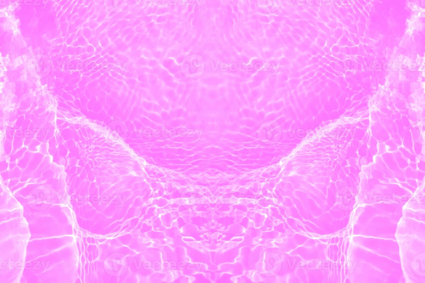 Defocus blurred transparent purple colored clear calm water surface texture with splashes and bubbles. Trendy abstract nature background. Water waves in sunlight with copy space. Pink water drop shine photo