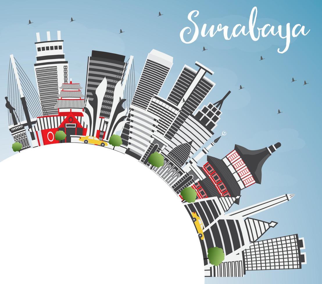 horizonte de surabaya con edificios grises, cielo azul y espacio para copiar. vector