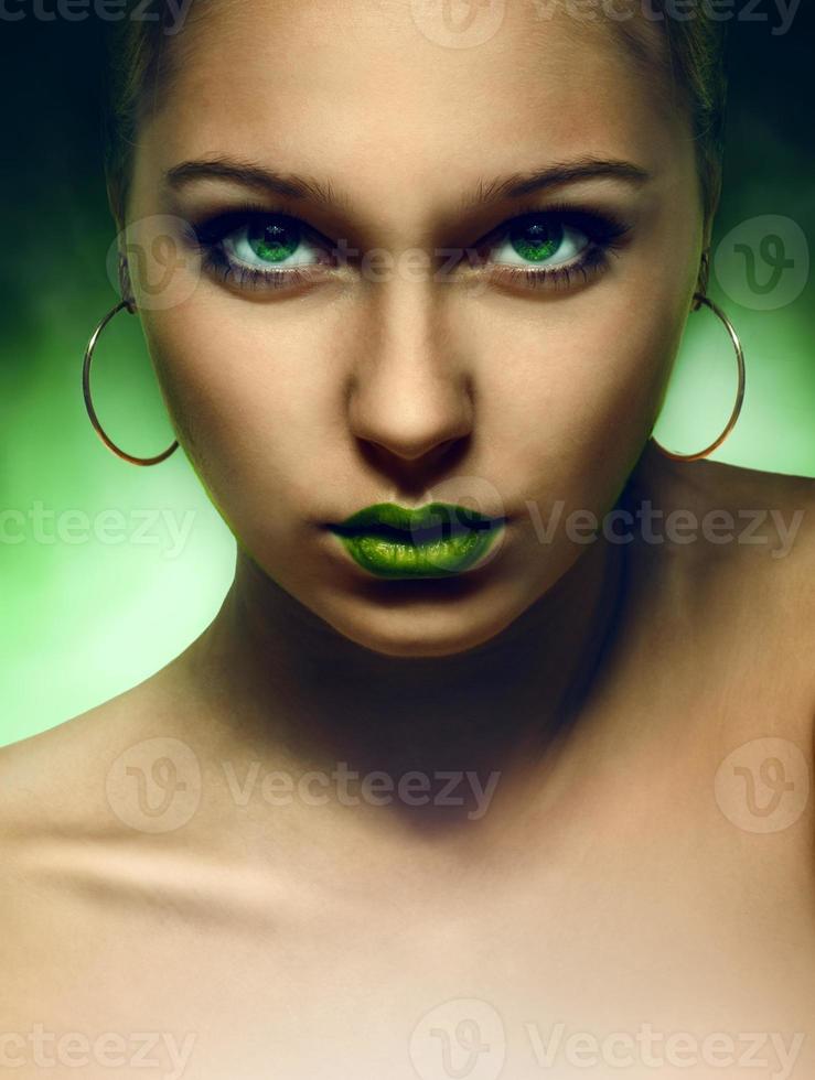 portrait of girl with green eyes and lips photo