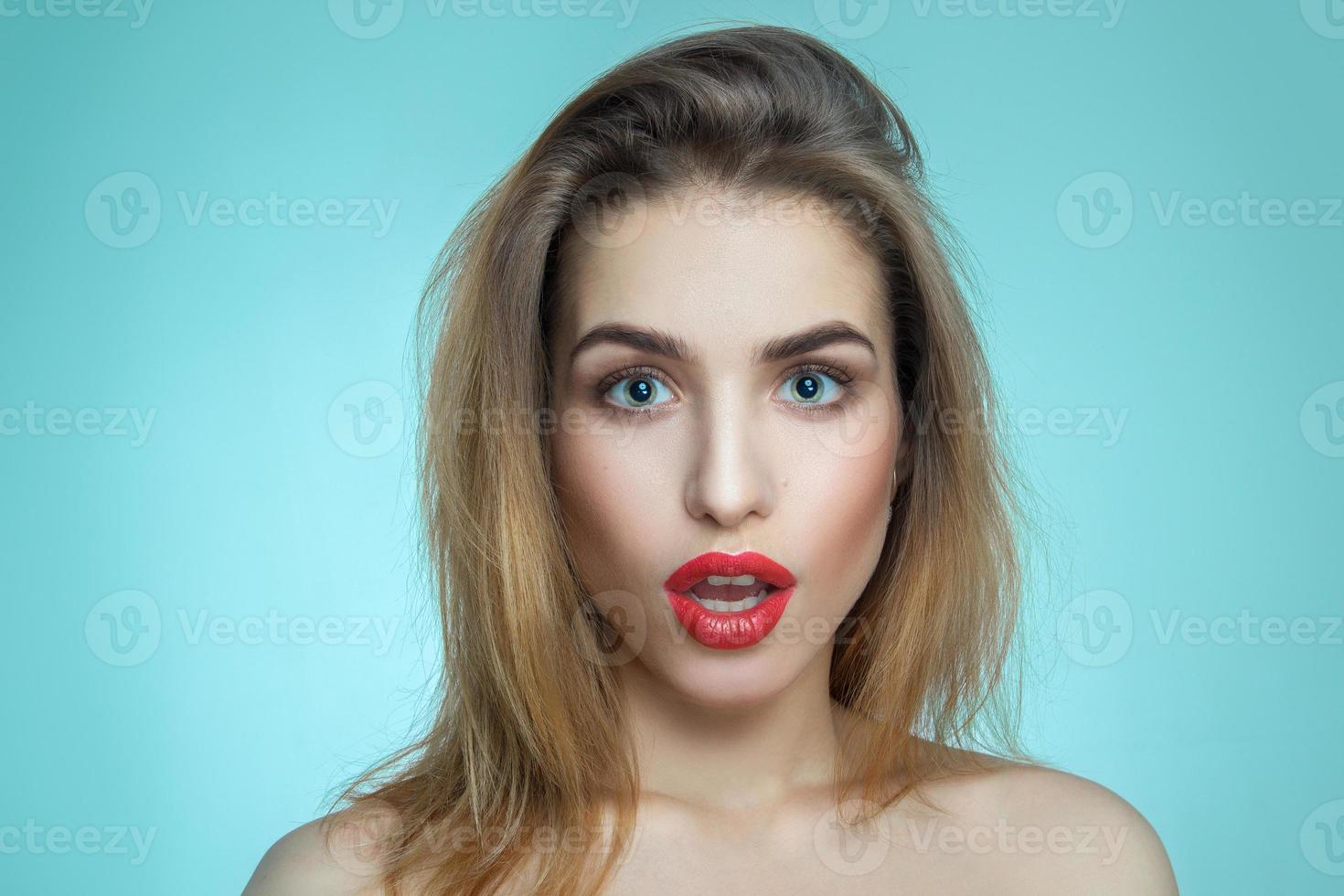 girl with red lips surprised photo