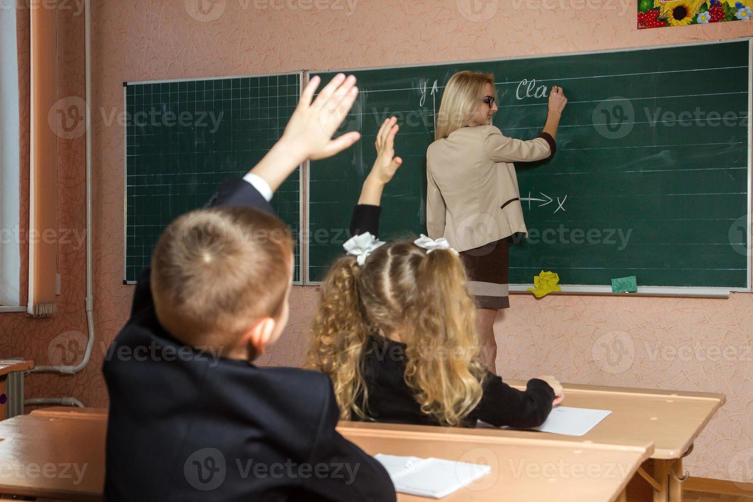 Children at the school lesson photo