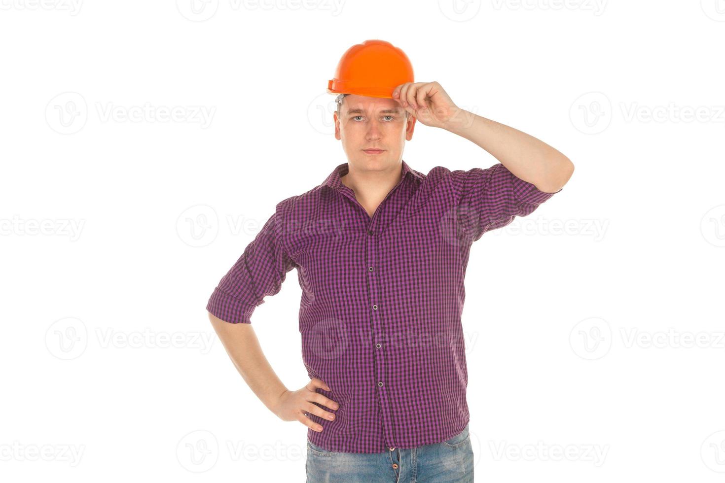 builder in helmet looking at the camera photo