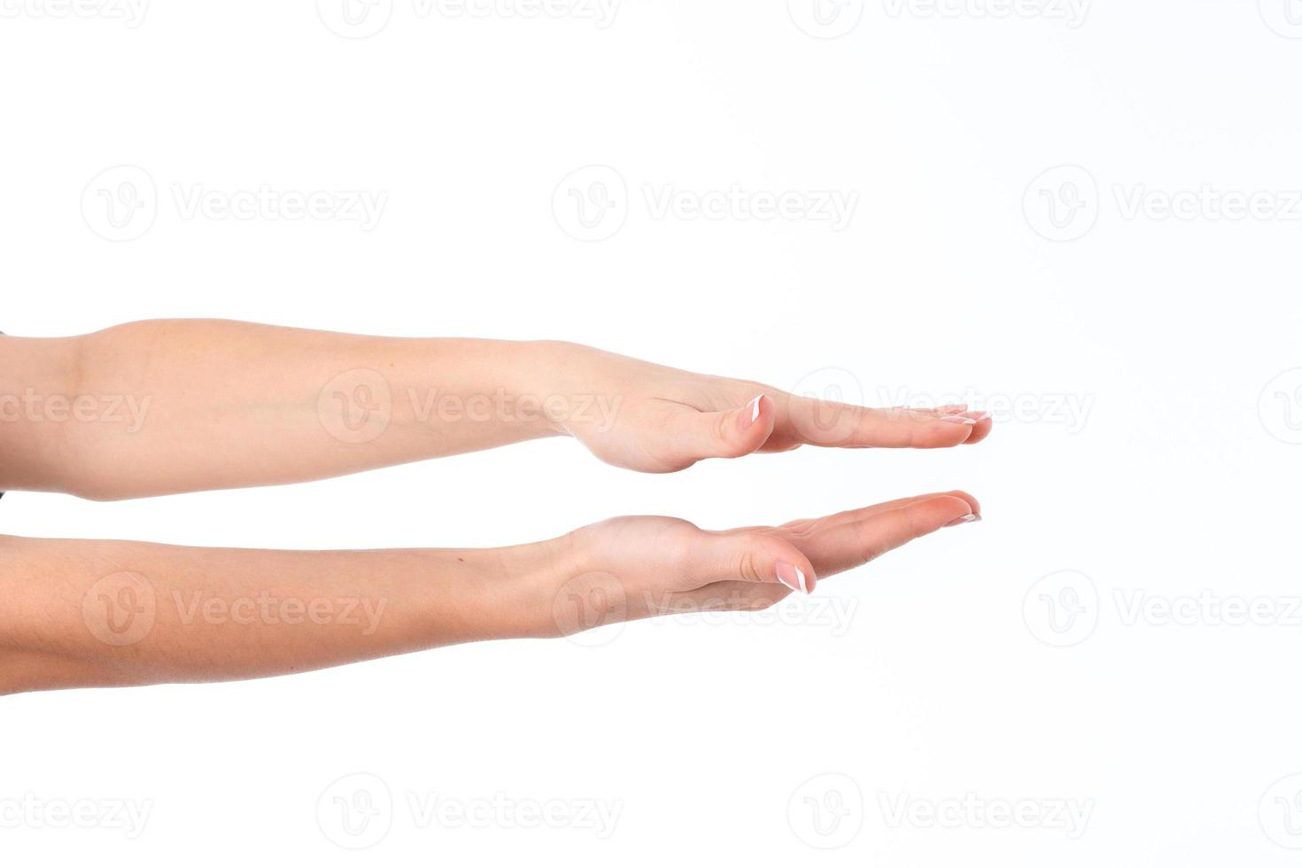 two hands outstretched toward the one opposite the other photo