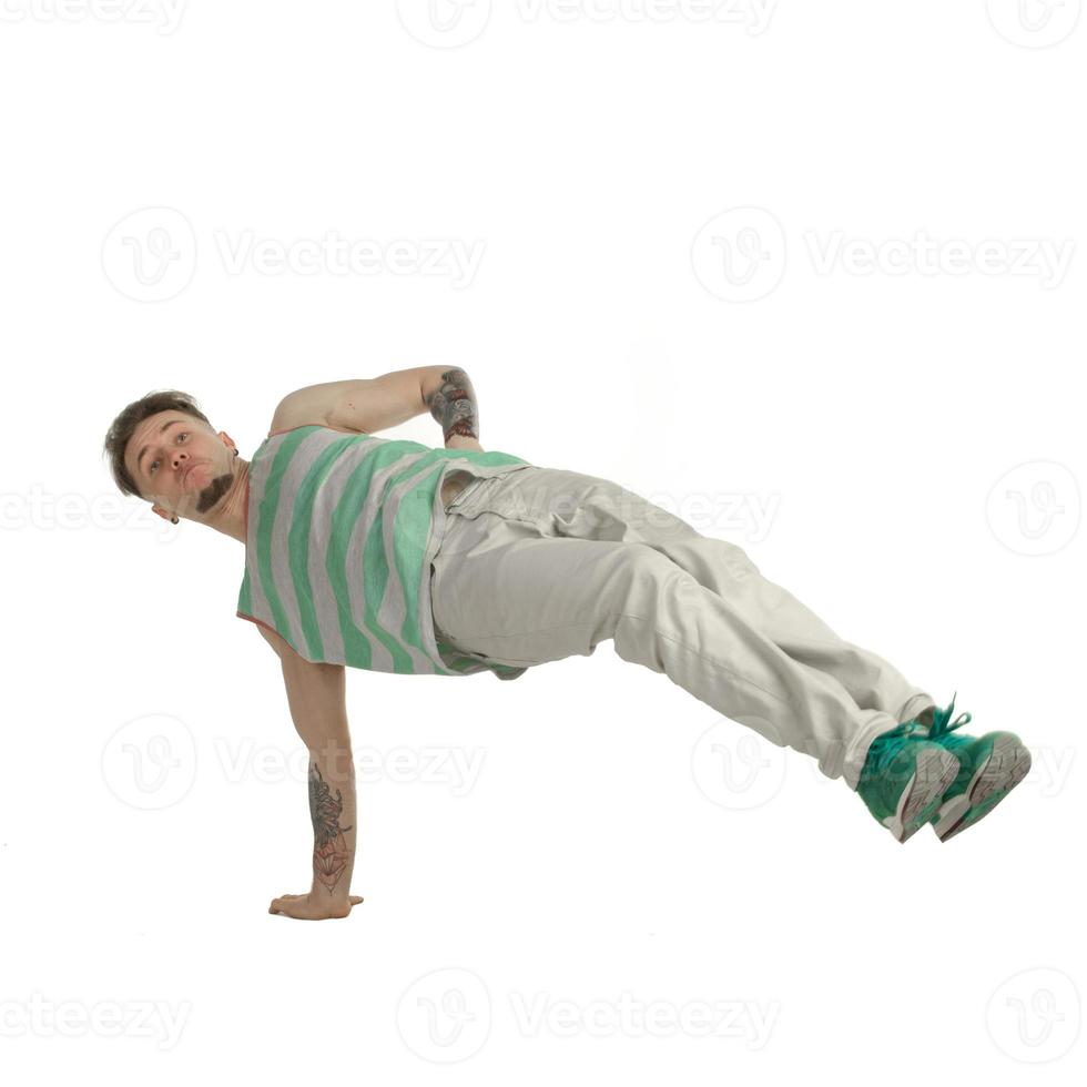 break dancer standing on one hand photo