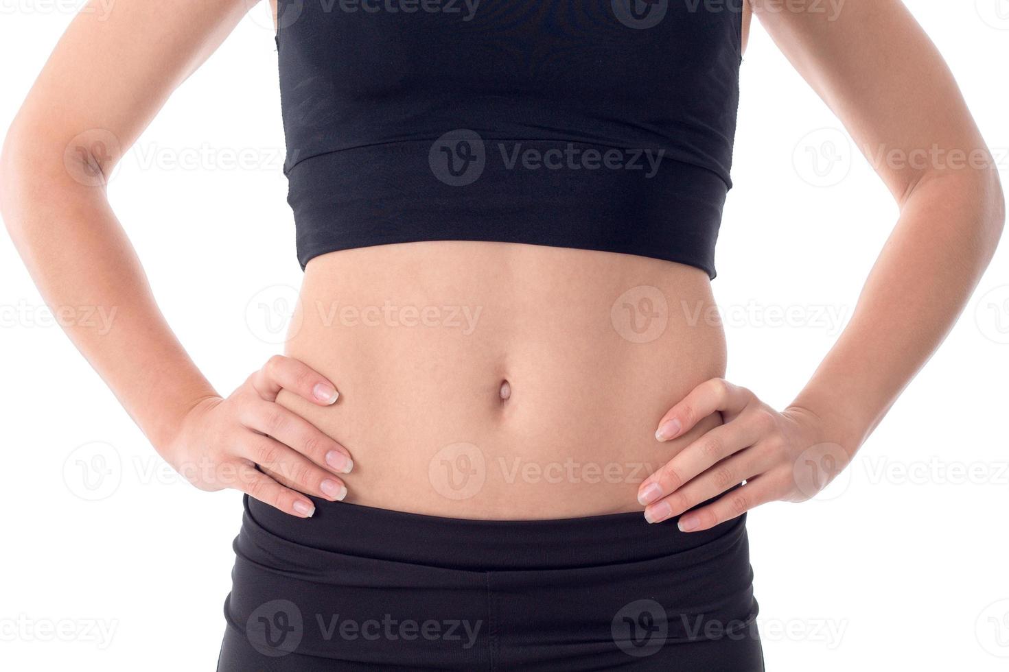 Flat tummy beautiful young athletic girl photo
