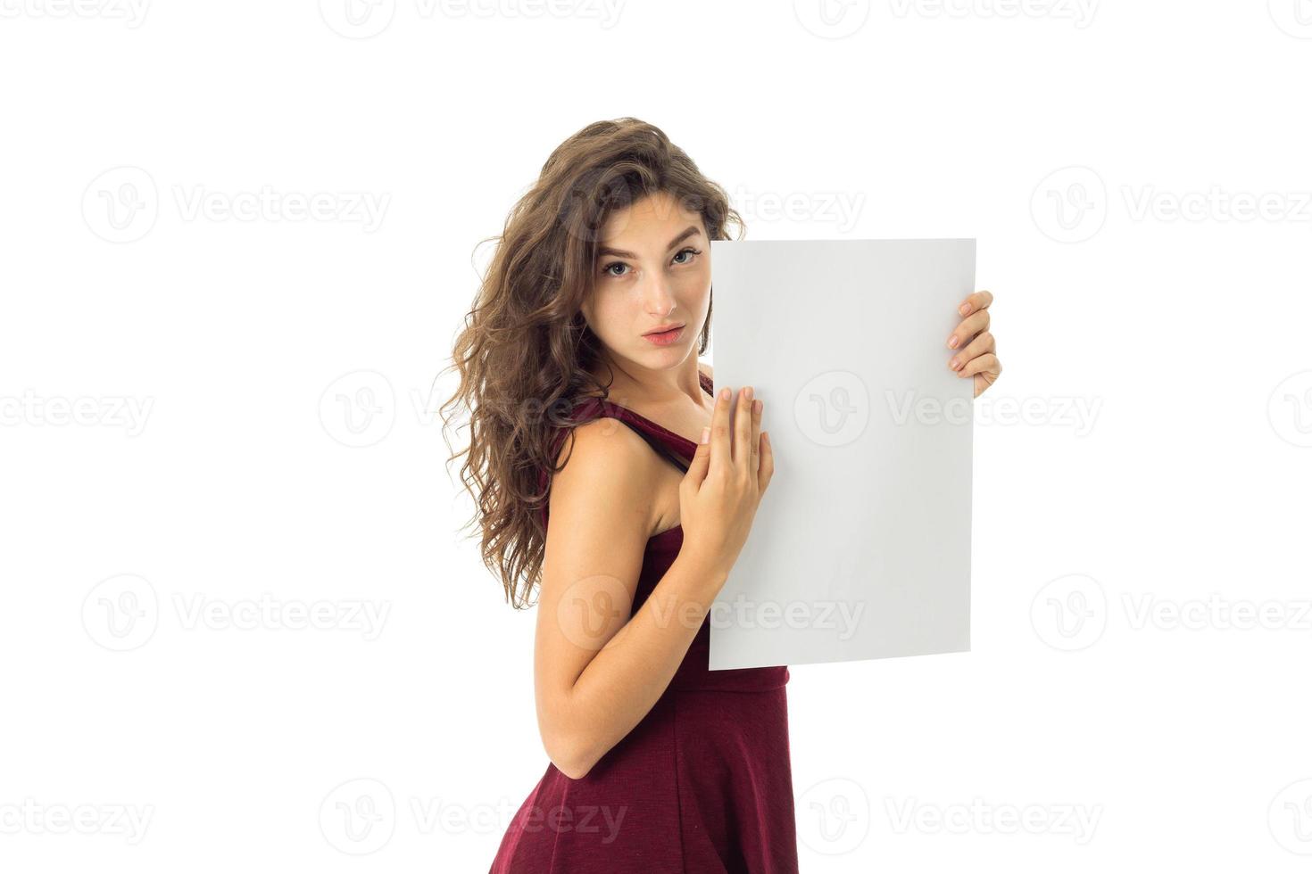 girl in red dress with white placard photo