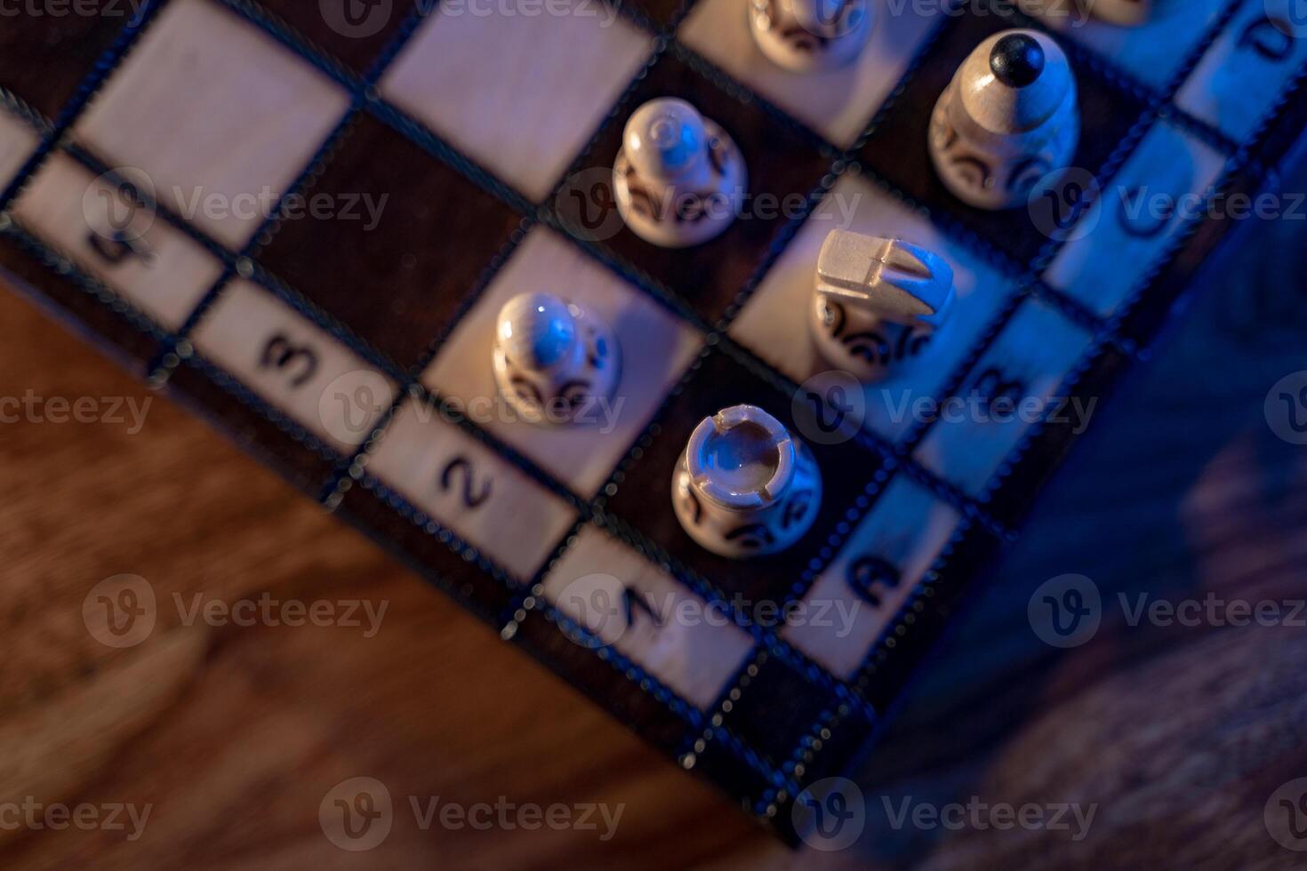 Chess board with chess pieces on blue background. Concept of business ideas and competition and strategy ideas. White rook close up. photo