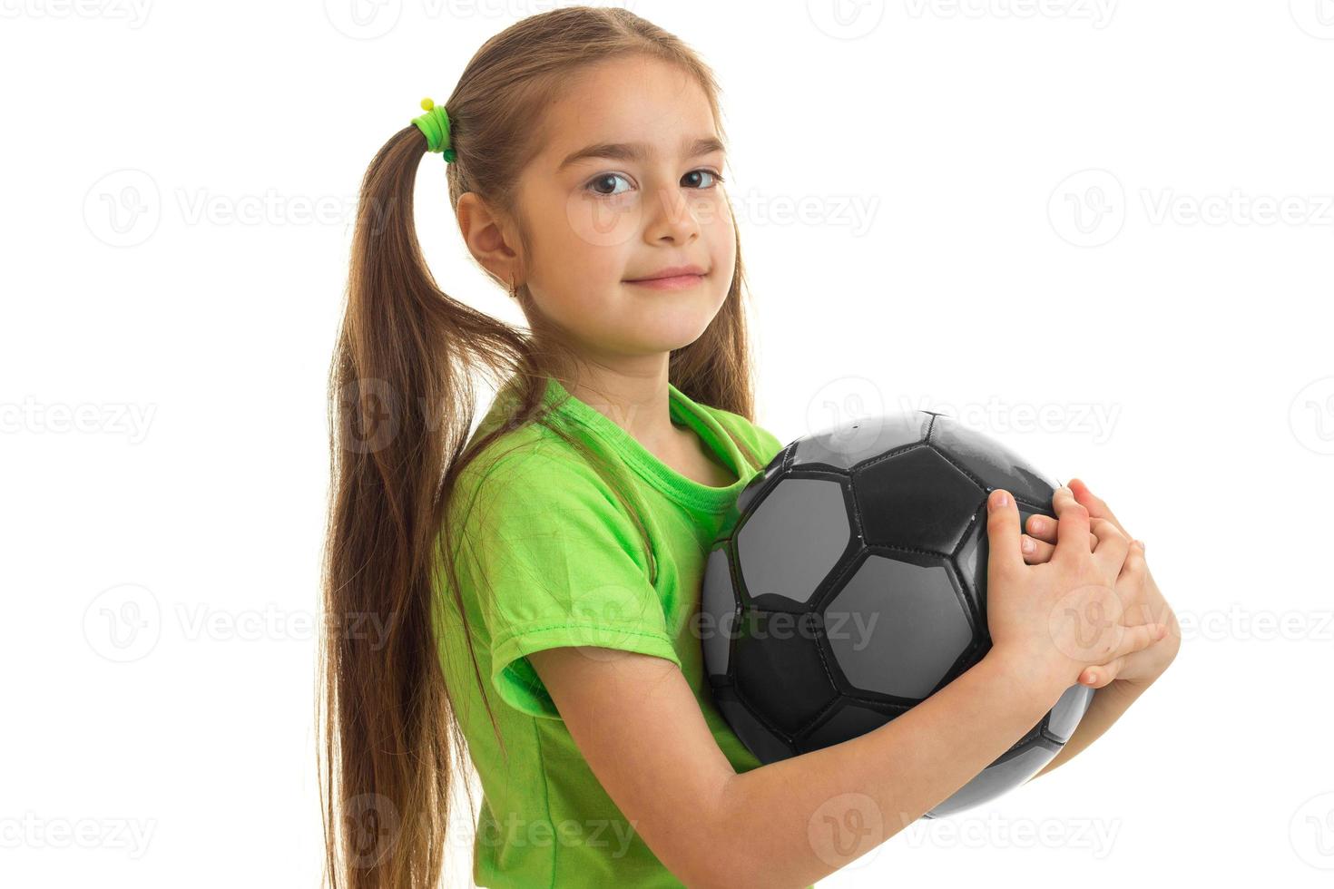 Portrait of the cutest girls with the ball isolated on a white background photo