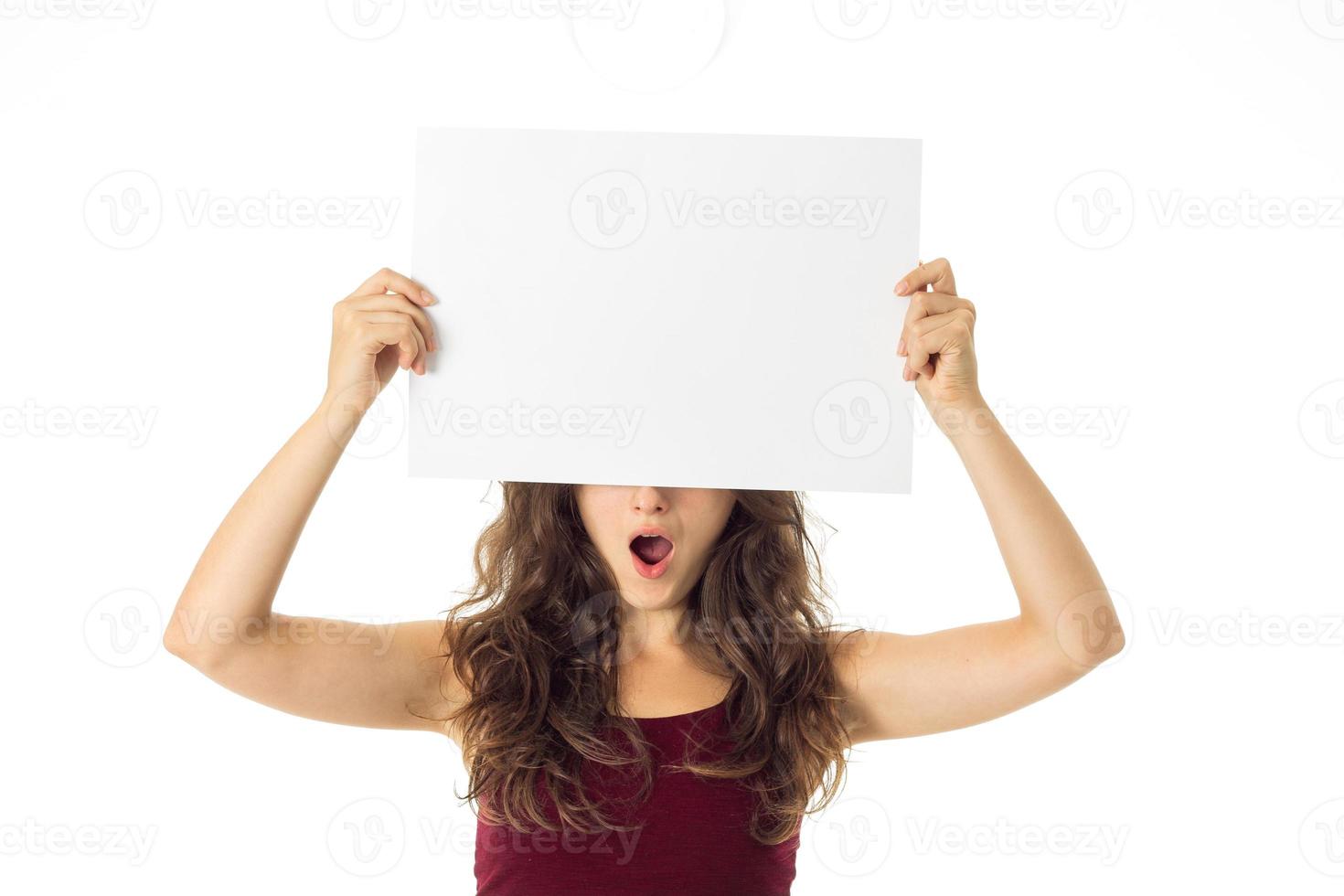 girl in red dress with white placard photo