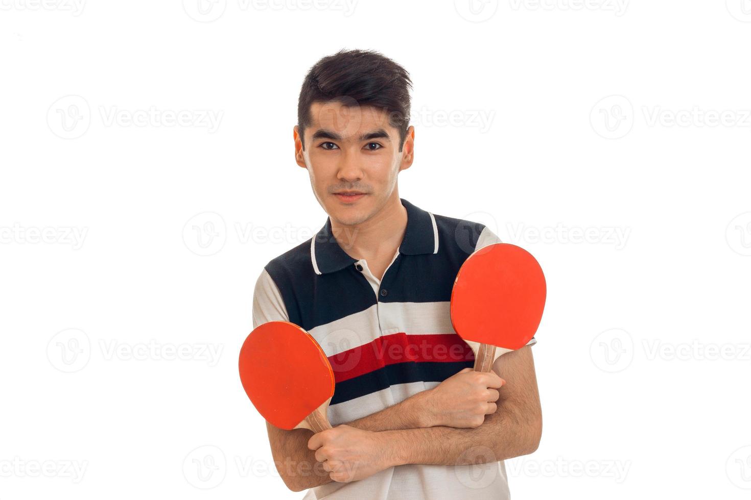 young brunette sports man practicing ping-ping isolated on white background photo