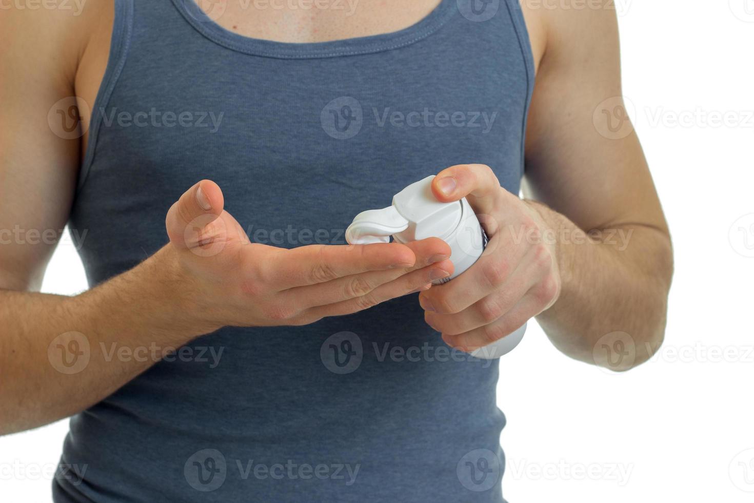 man causes shaving foam on hand close-up photo