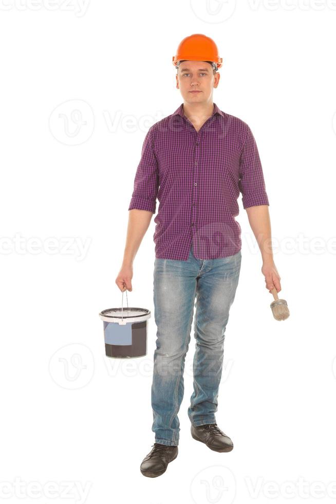 man painter in hardhat with bucket and brush photo