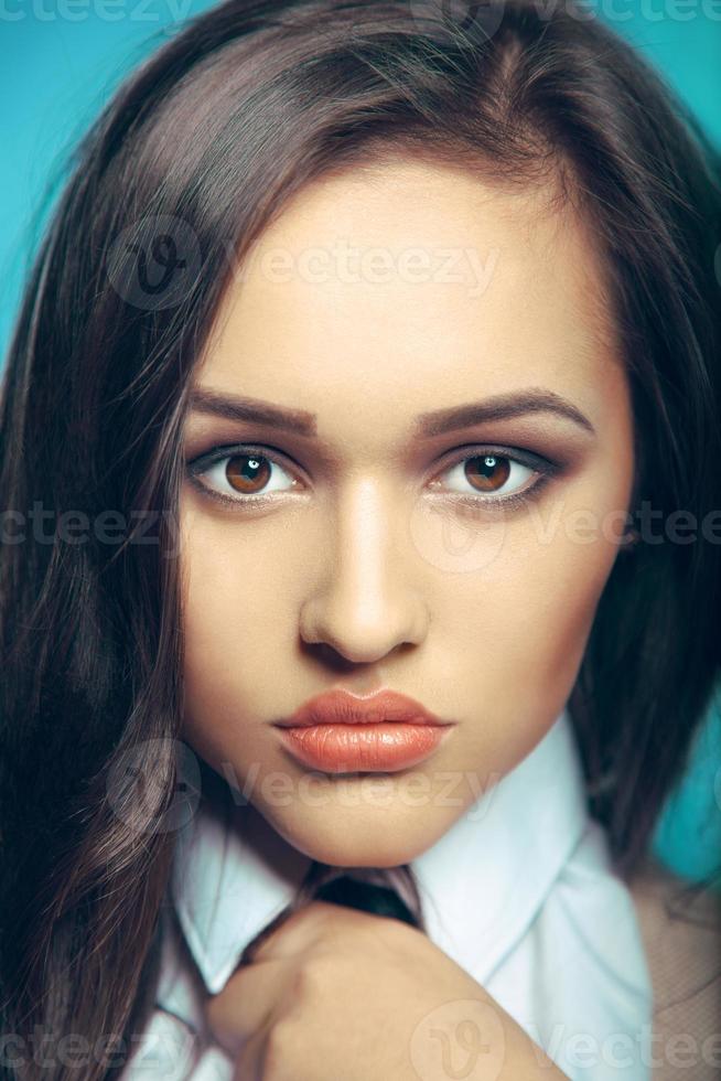 close up portrait of a pretty young woman in studio photo