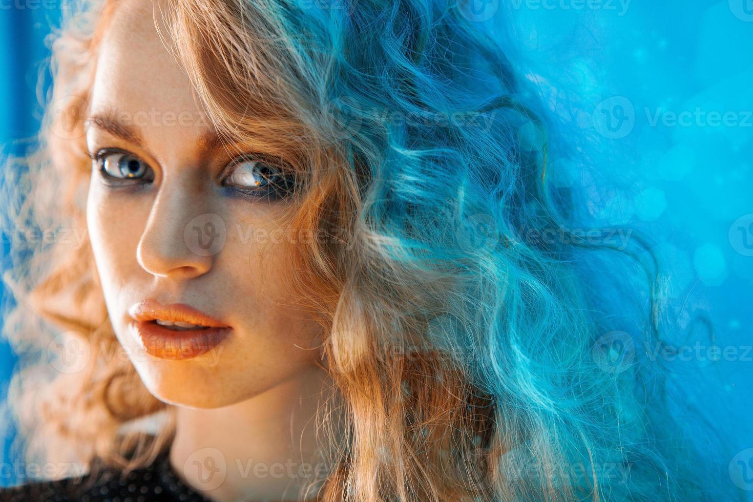 Horizontal portrait of beauty female with curly hair photo