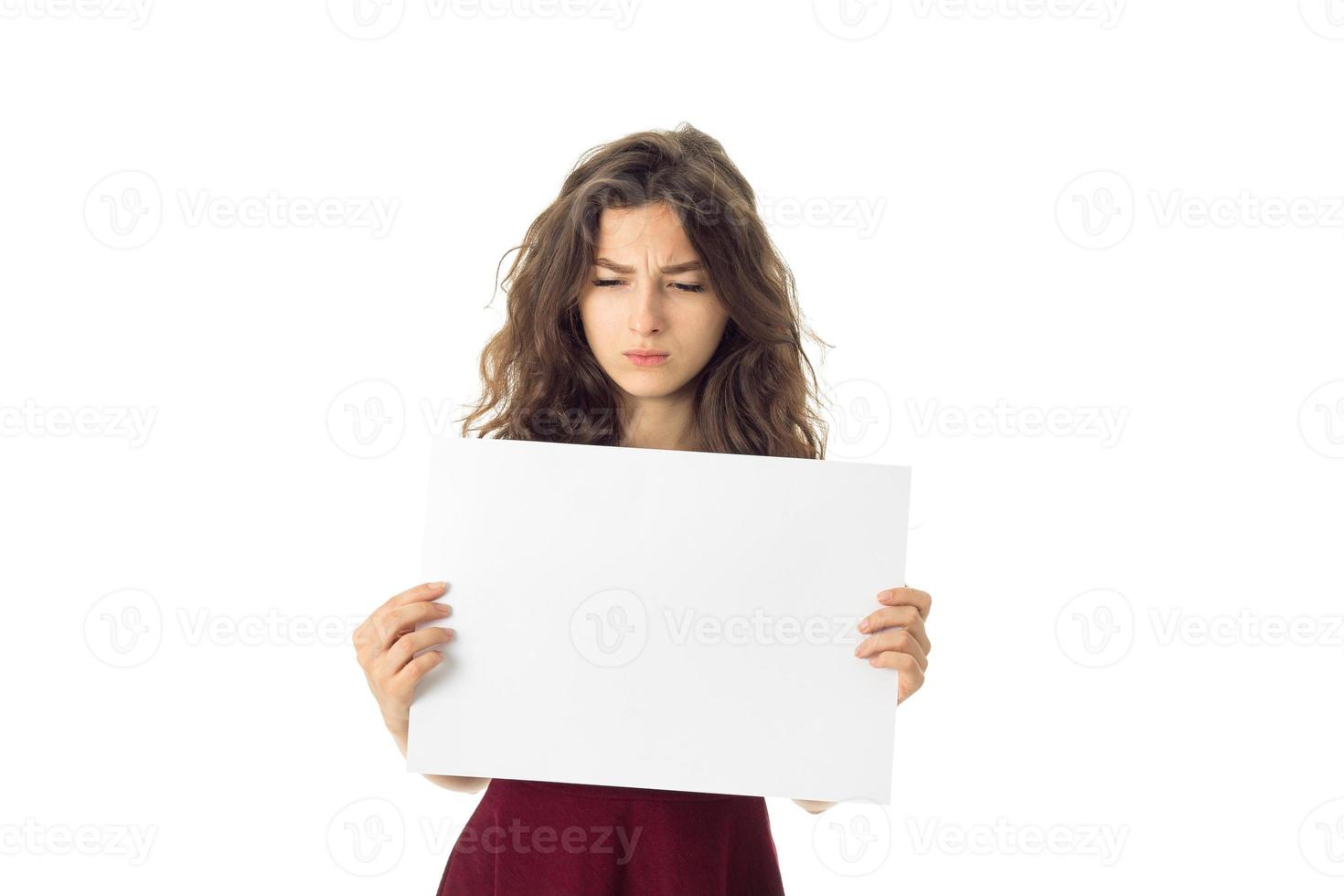 girl in red dress with white placard photo