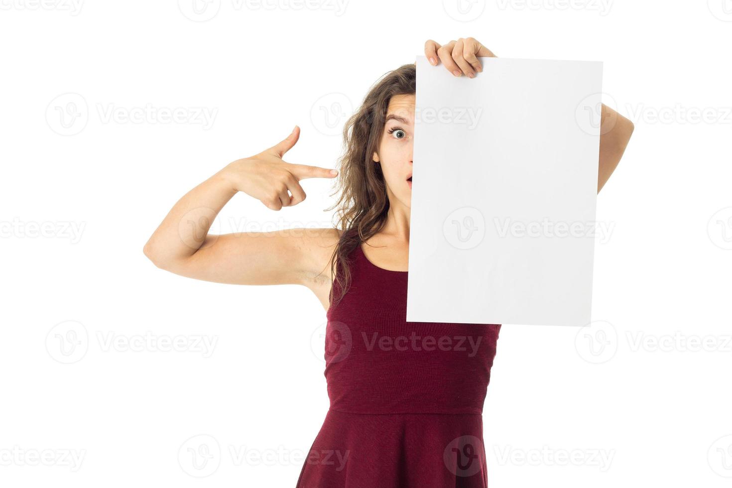 girl in red dress with white placard photo