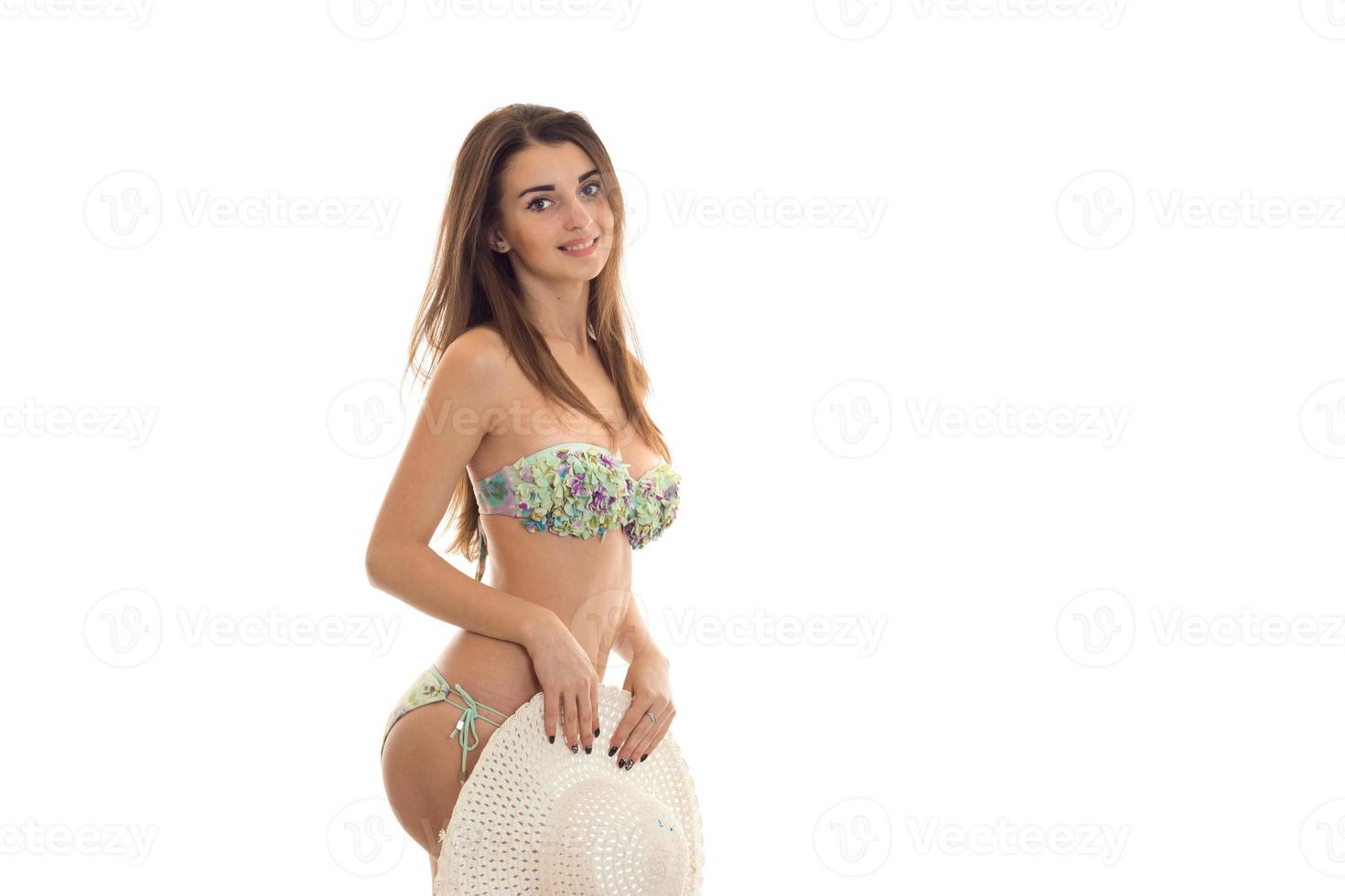 sexy slim brunette woman in swisuit and hat posing isolated on white  background 16096031 Stock Photo at Vecteezy