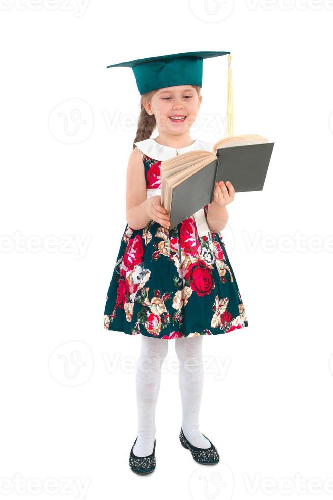 Girl in a hat with a book photo