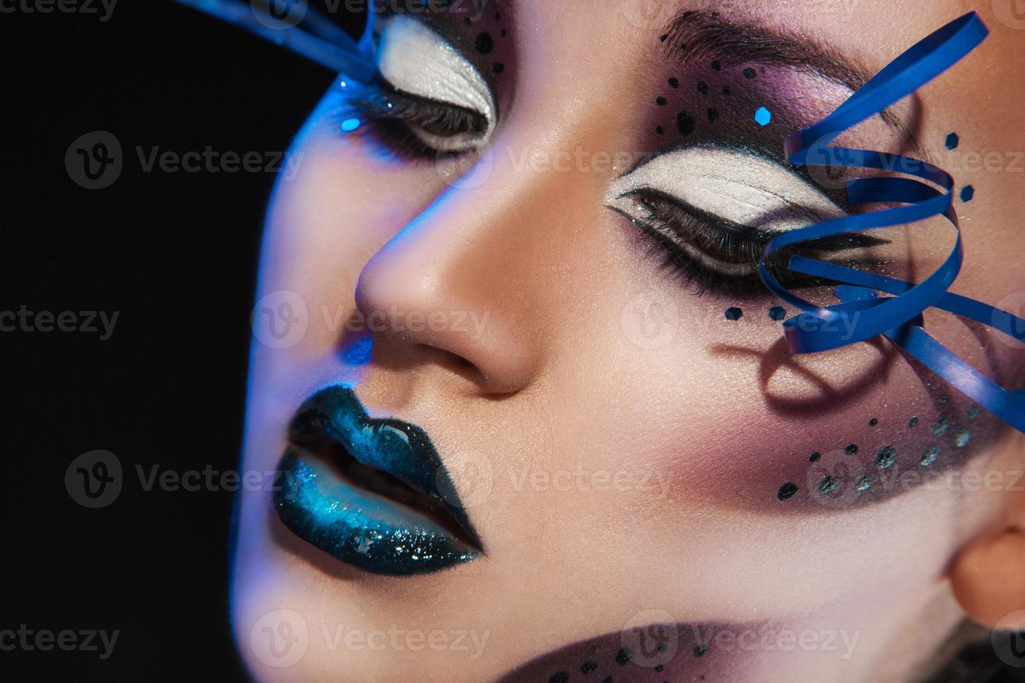 Close up photo of beautiful girl with creative make up and healthy skin