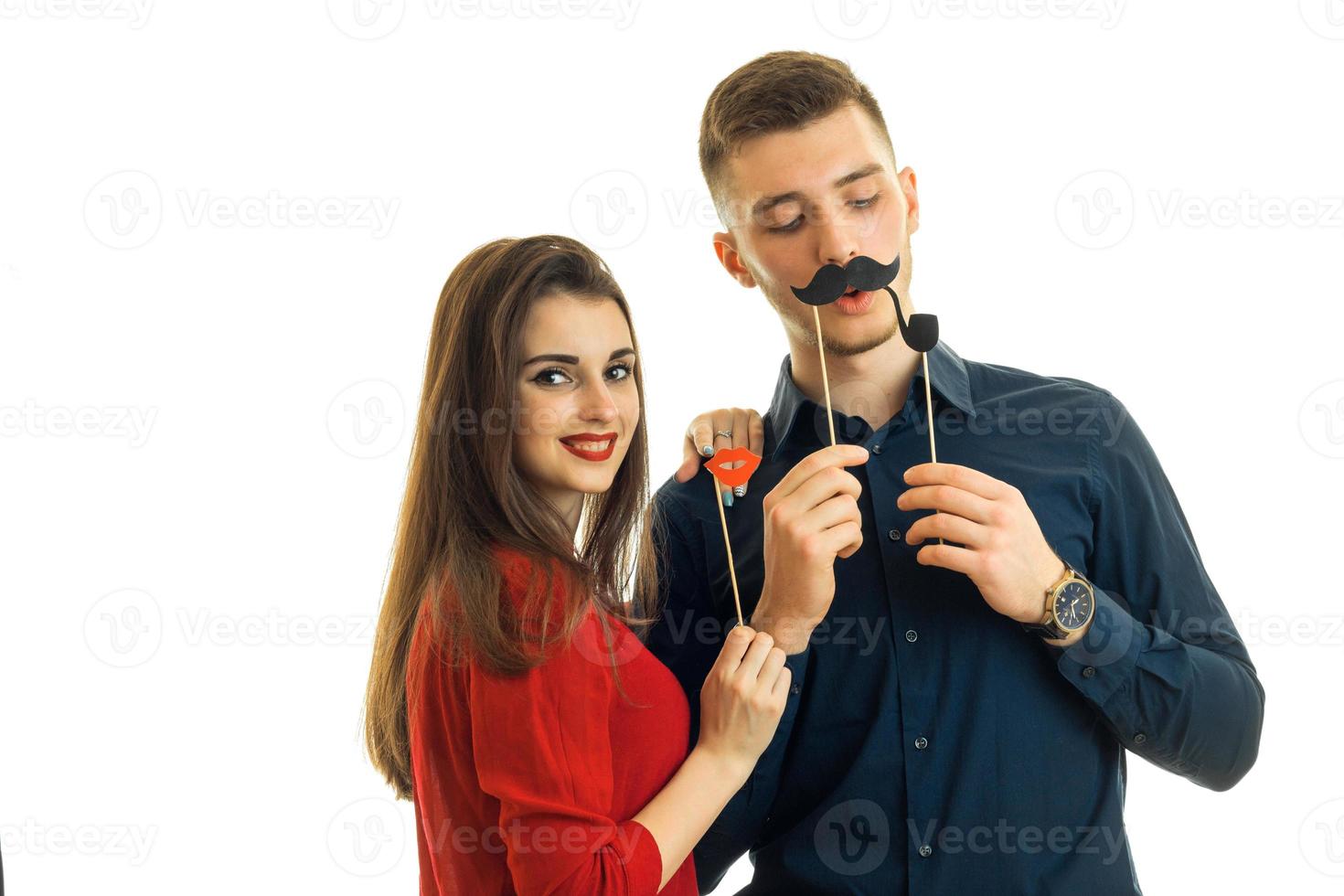 amazing fun couple keep near persons paper Dummies for photo and laughing