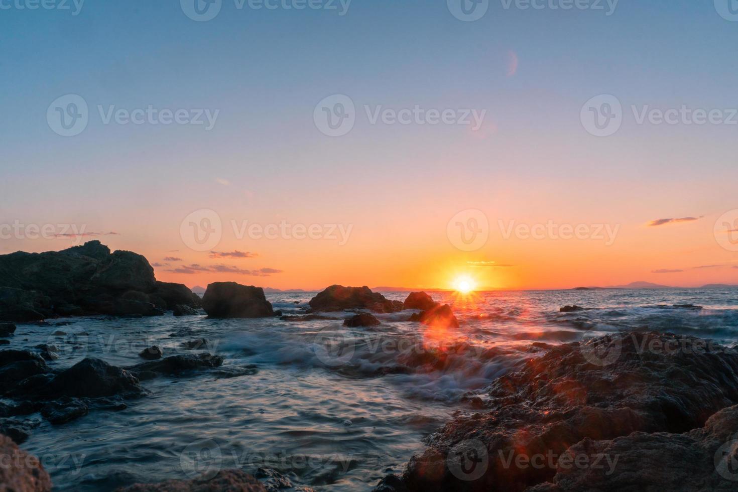 beautiful sunset on the boundless sea, Rocky photo