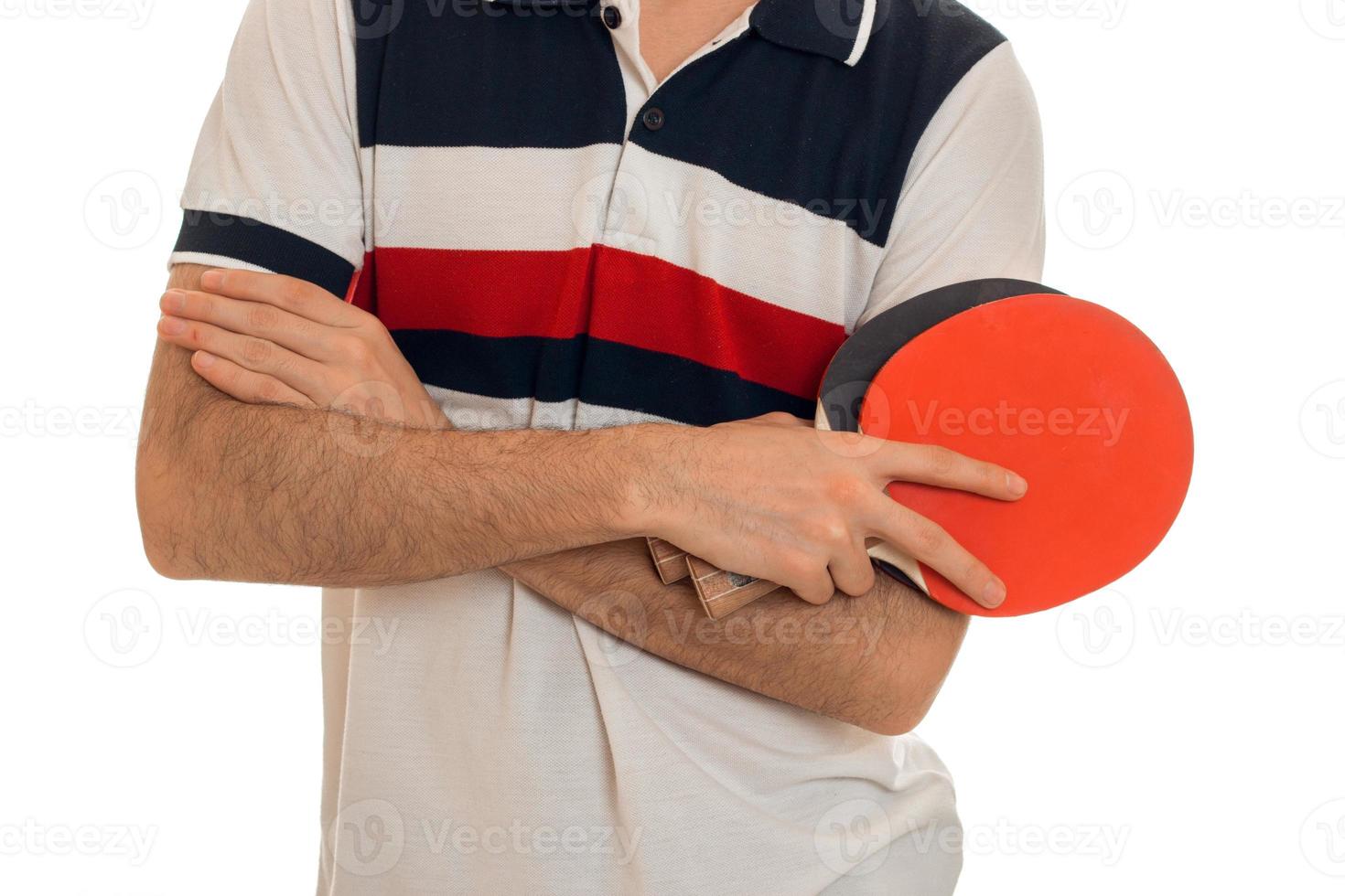 close up of sports man playing ping-pong isolated on white background photo