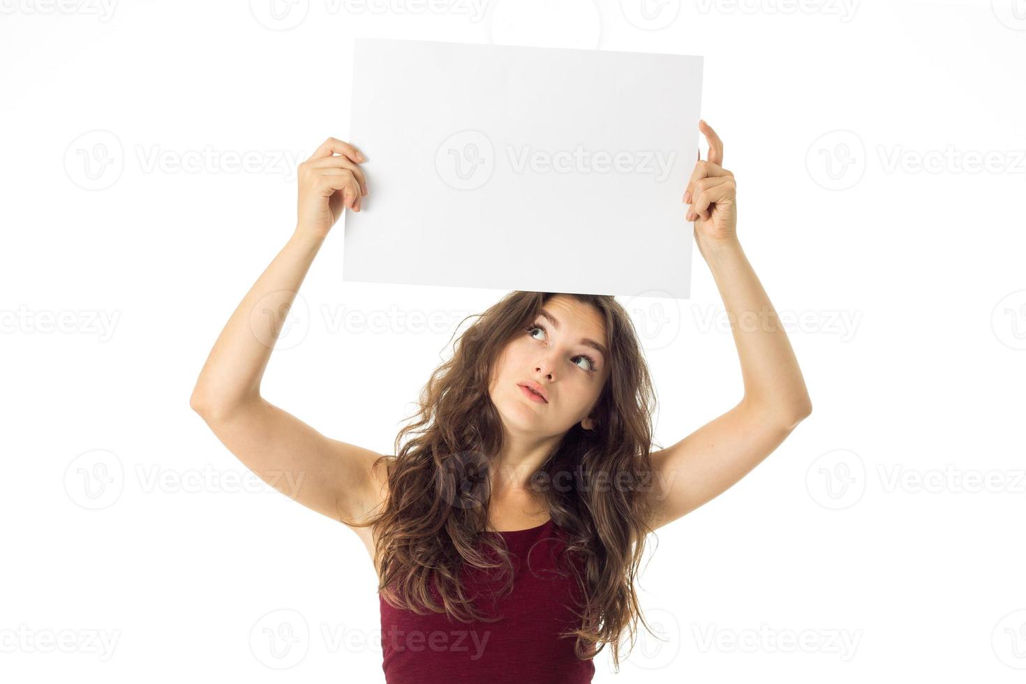 girl in red dress with white placard photo