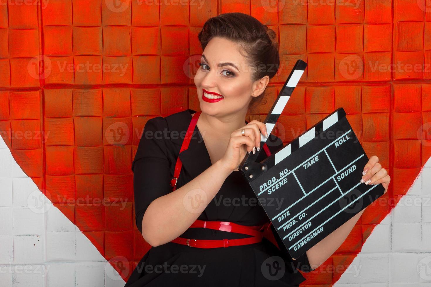 Woman with the clapper photo